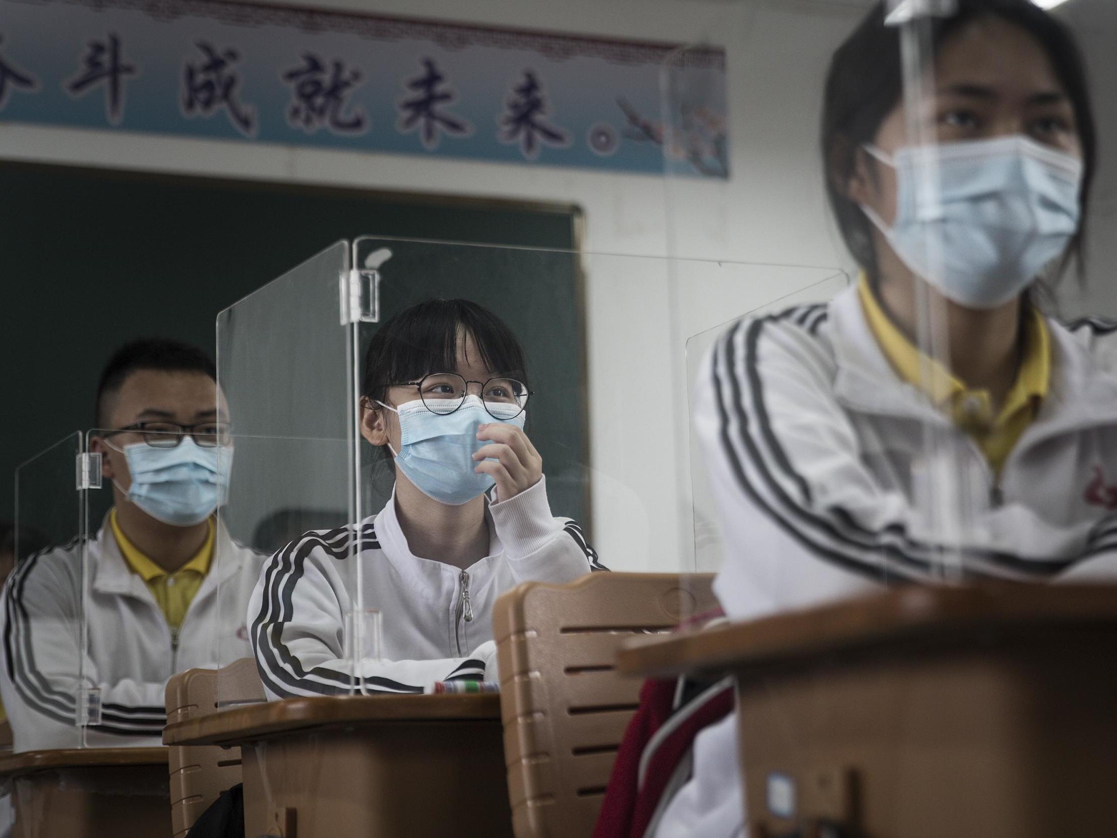 New containment measures have been enforced as schools have started opening across Wuhan and elsewhere in China (Getty)