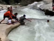 Hiker rescued from whirlpool by bystanders in dramatic video