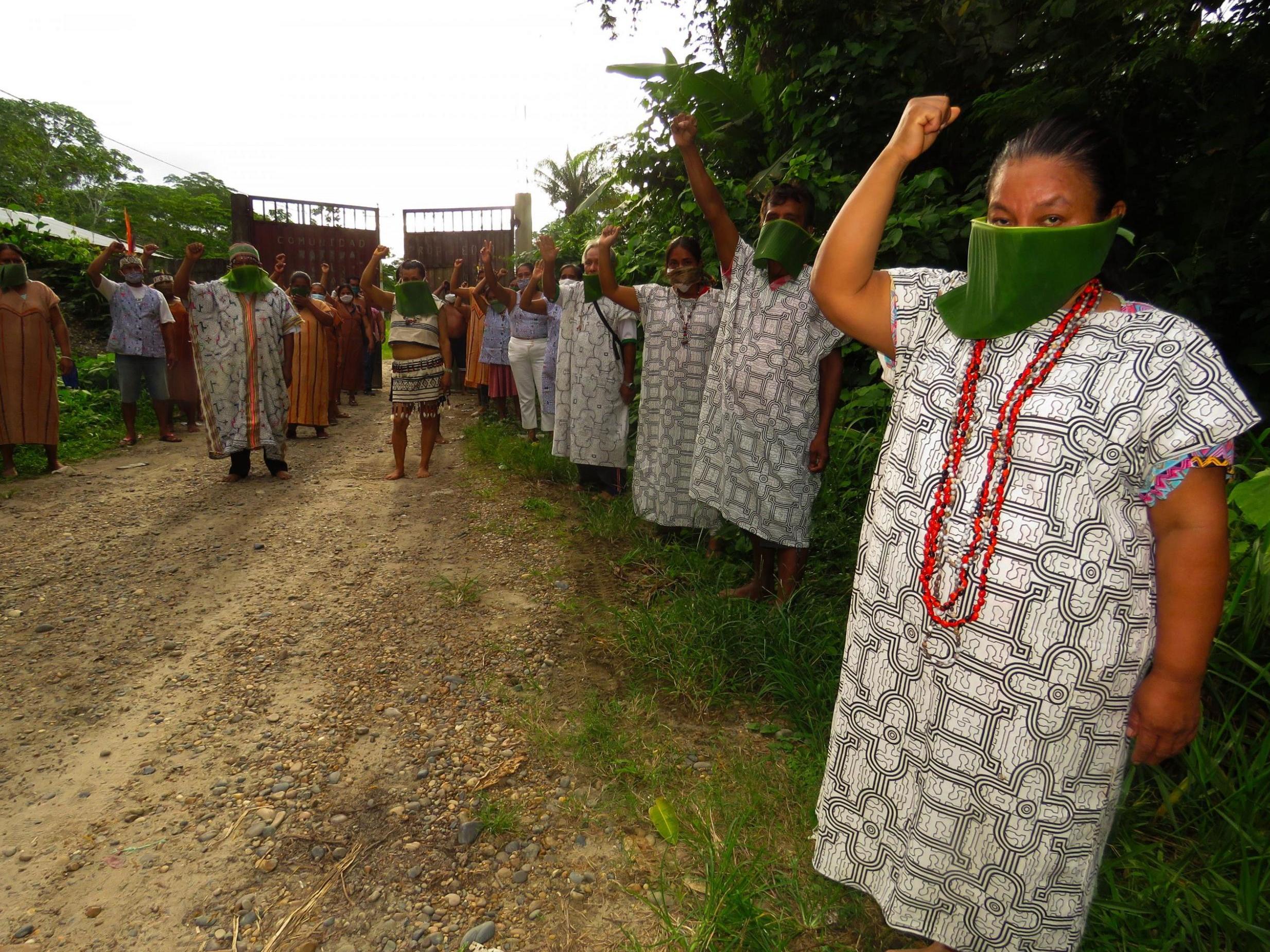 Indigenous Shipibo in the Peruvian province of Ucayali wear face masks made of leaves