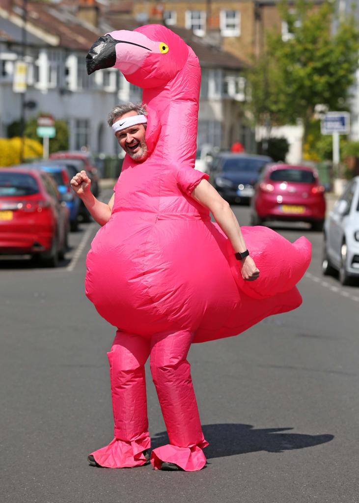 Fred Smith on his daily three-mile run dressed as a flamingo