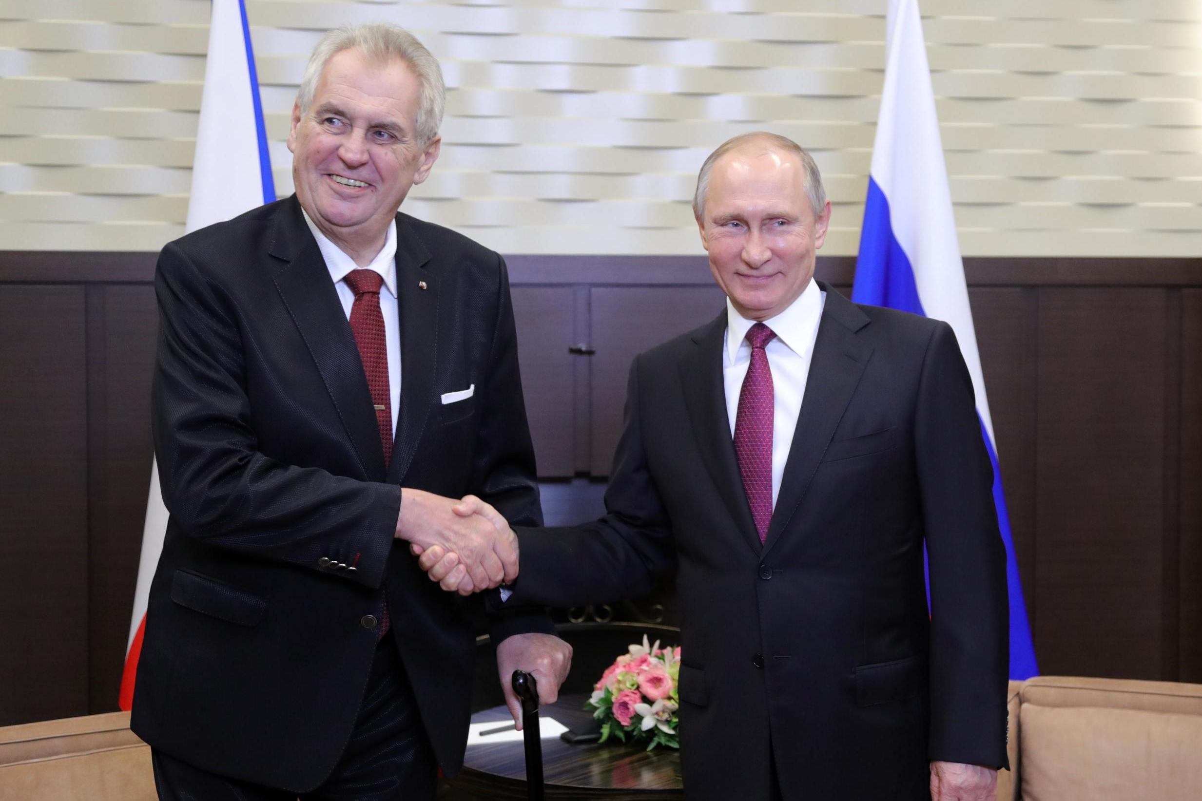 Vladimir Putin (right) shakes hands with his Czech counterpart Milos Zeman at a meeting in Sochi in 2017