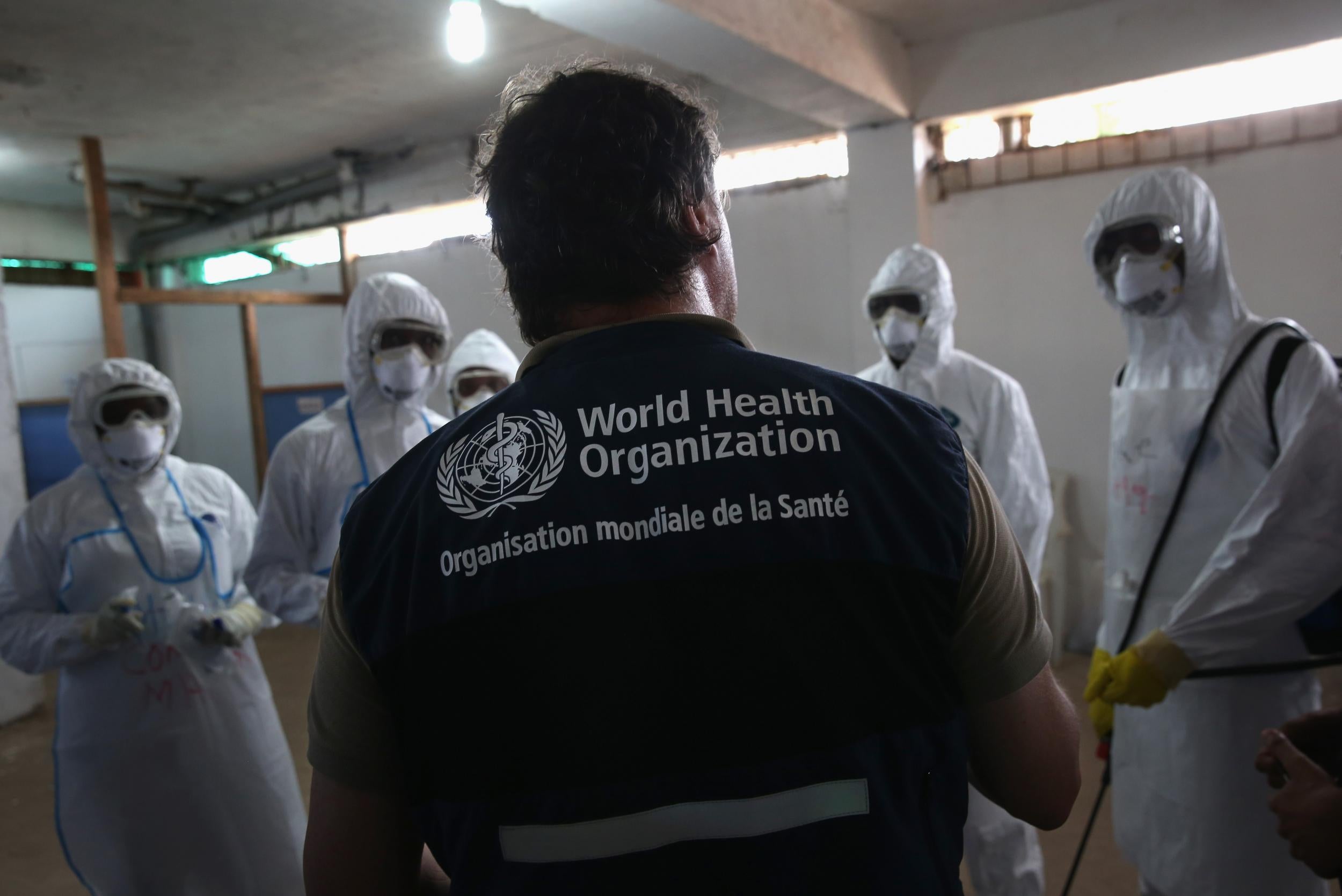 A WHO instructor trains health workers during the 2014 outbreak of Ebola in Liberia