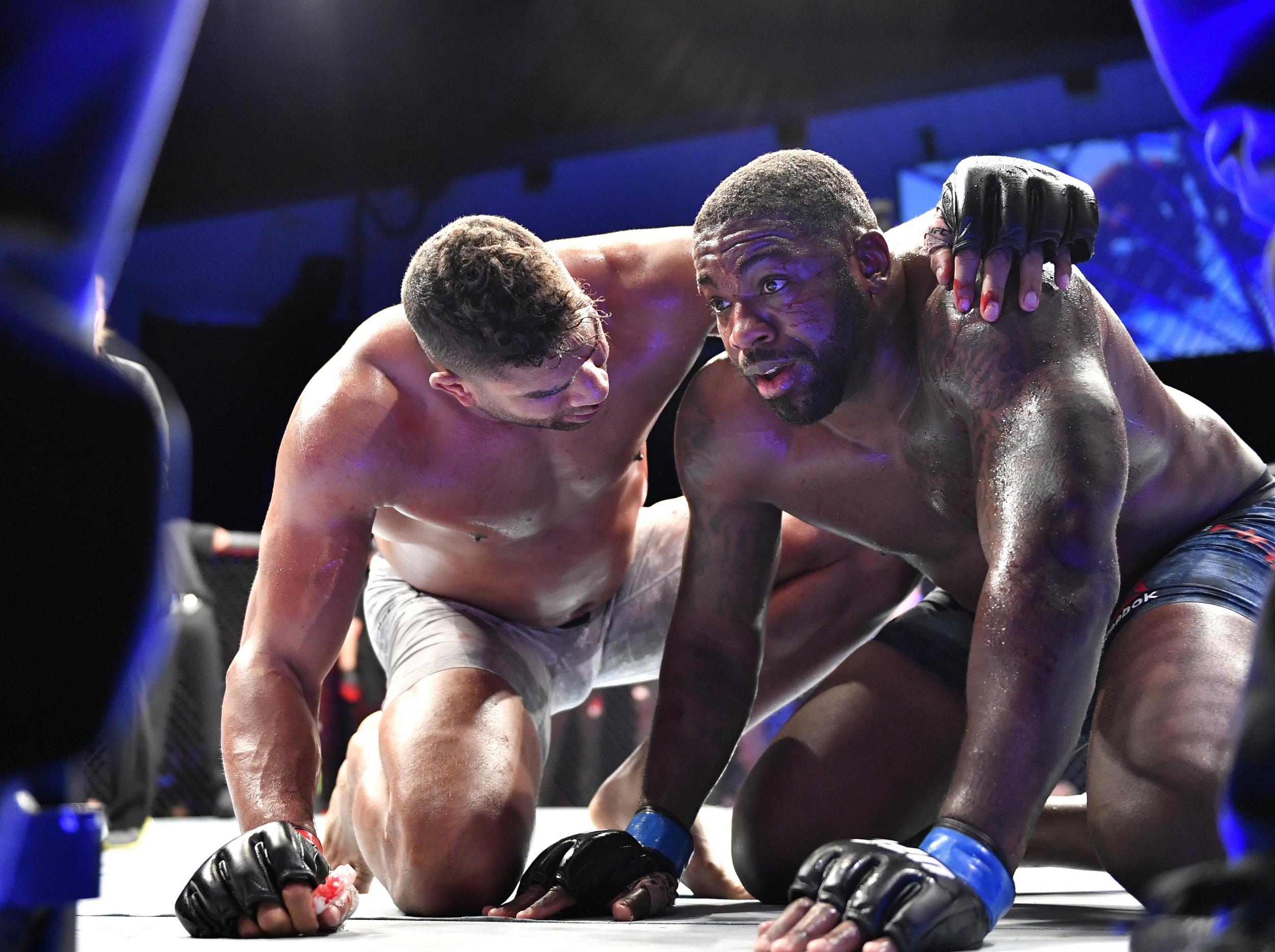 Alistair Overeem consoles Walt Harris