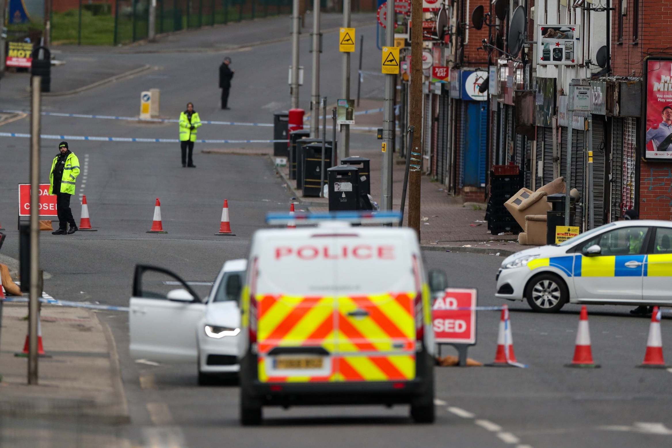 Police officers at the scene on King Street, Blackburn, on Sunday afternoon