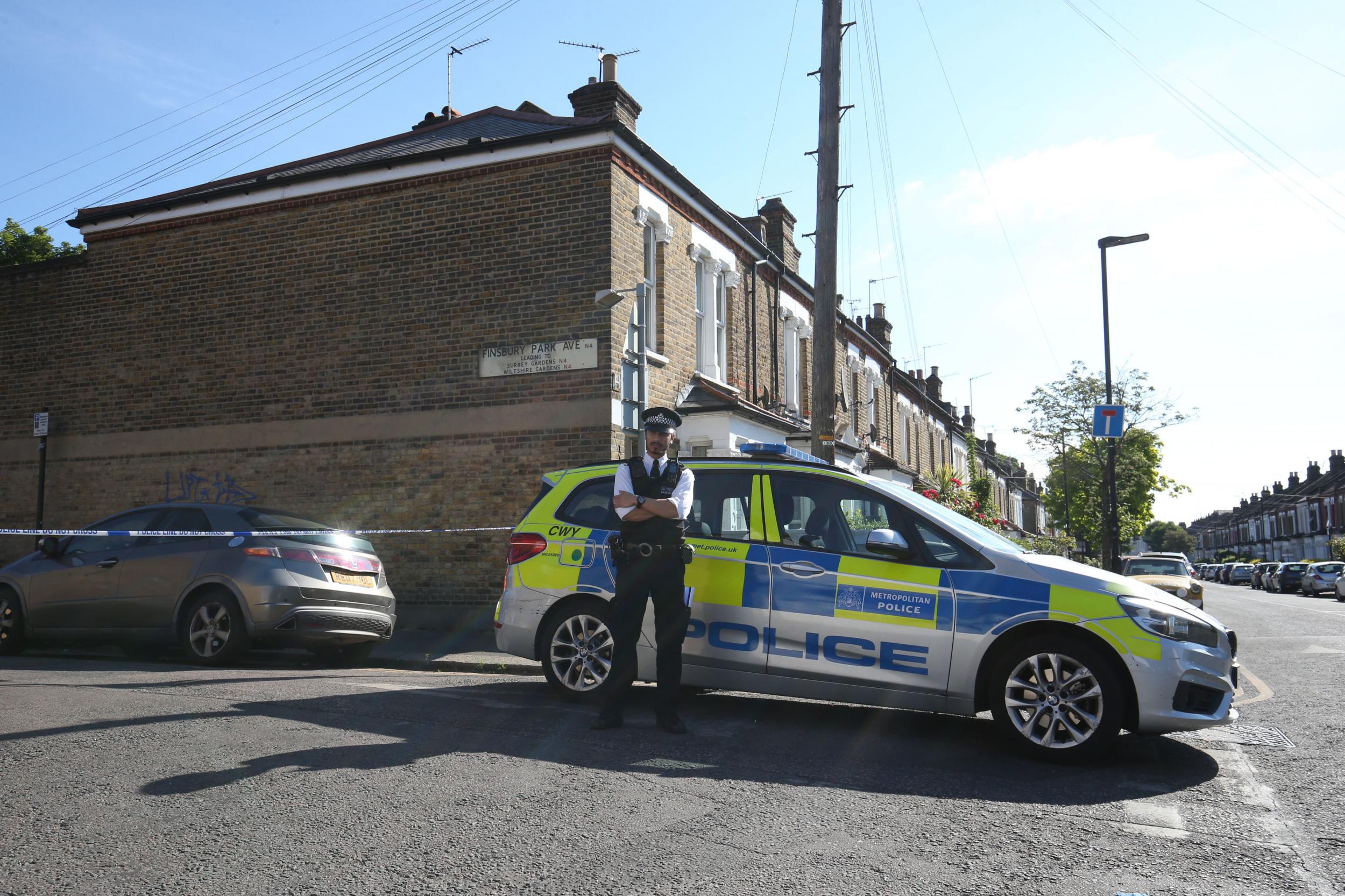 A police cordon in place in Finsbury Park Avenue near Wiltshire Gardens, Haringey, north London, following the fatal shooting of man