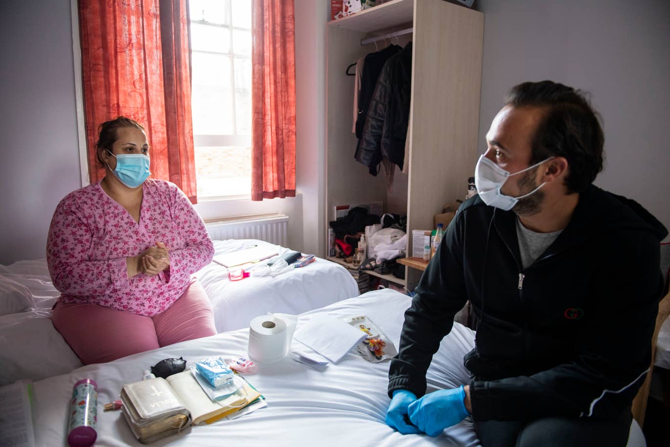 Evgeny Lebedev speaks to Ancuta Moise in her hotel room