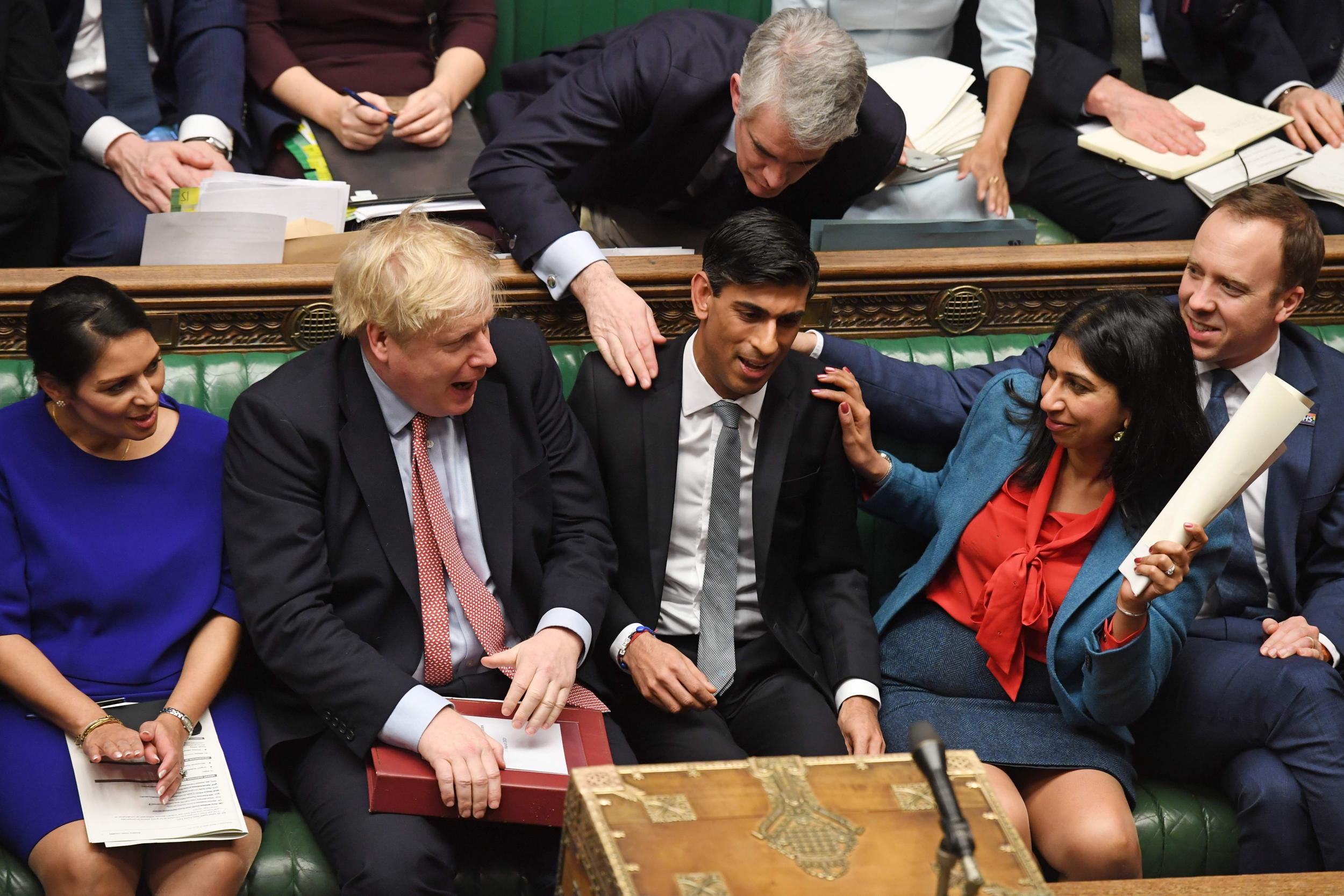 Sunak is applauded for his budget speech (UK Parliament/AFP via Getty)