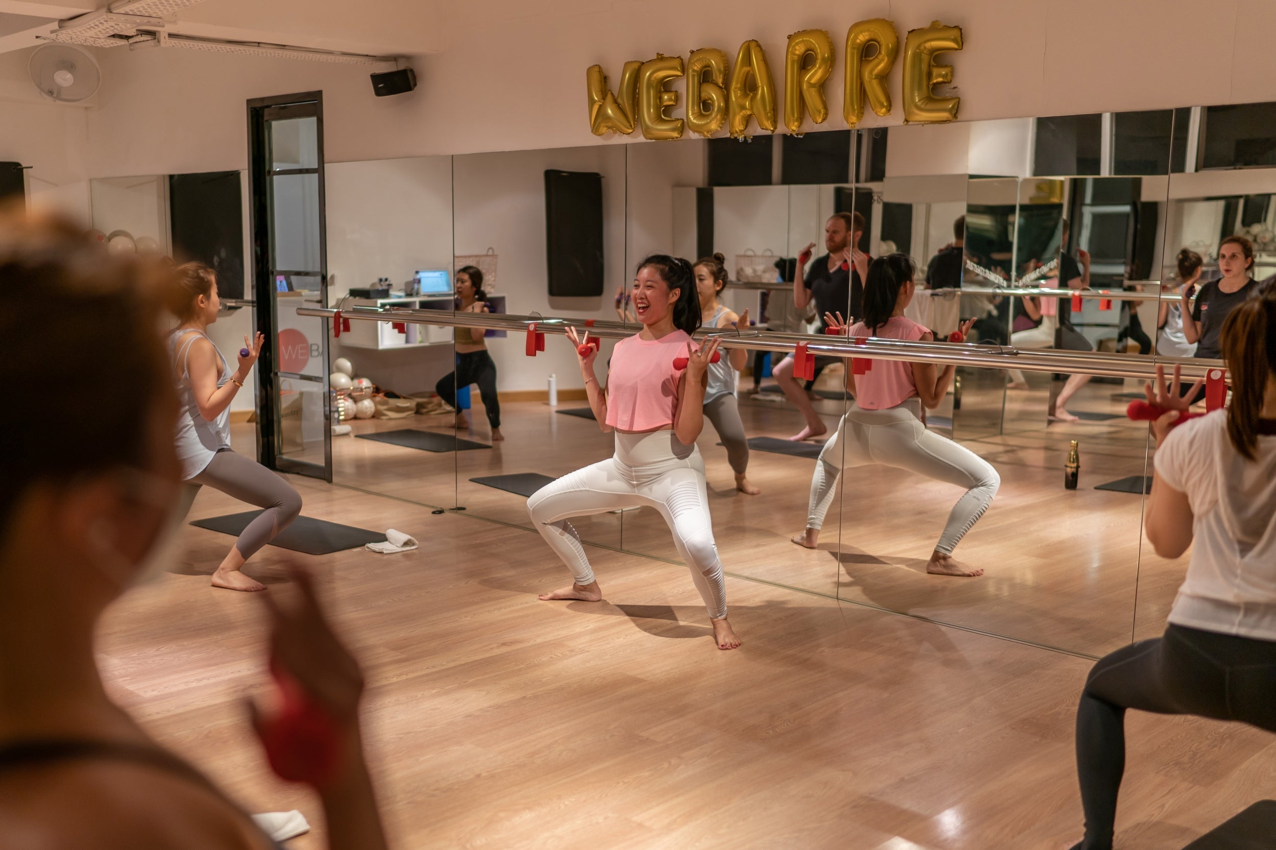 Fighting fit: WeBarre instructor Jan Quinlan leads a class for the first time since the mandatory shutdown six weeks earlier