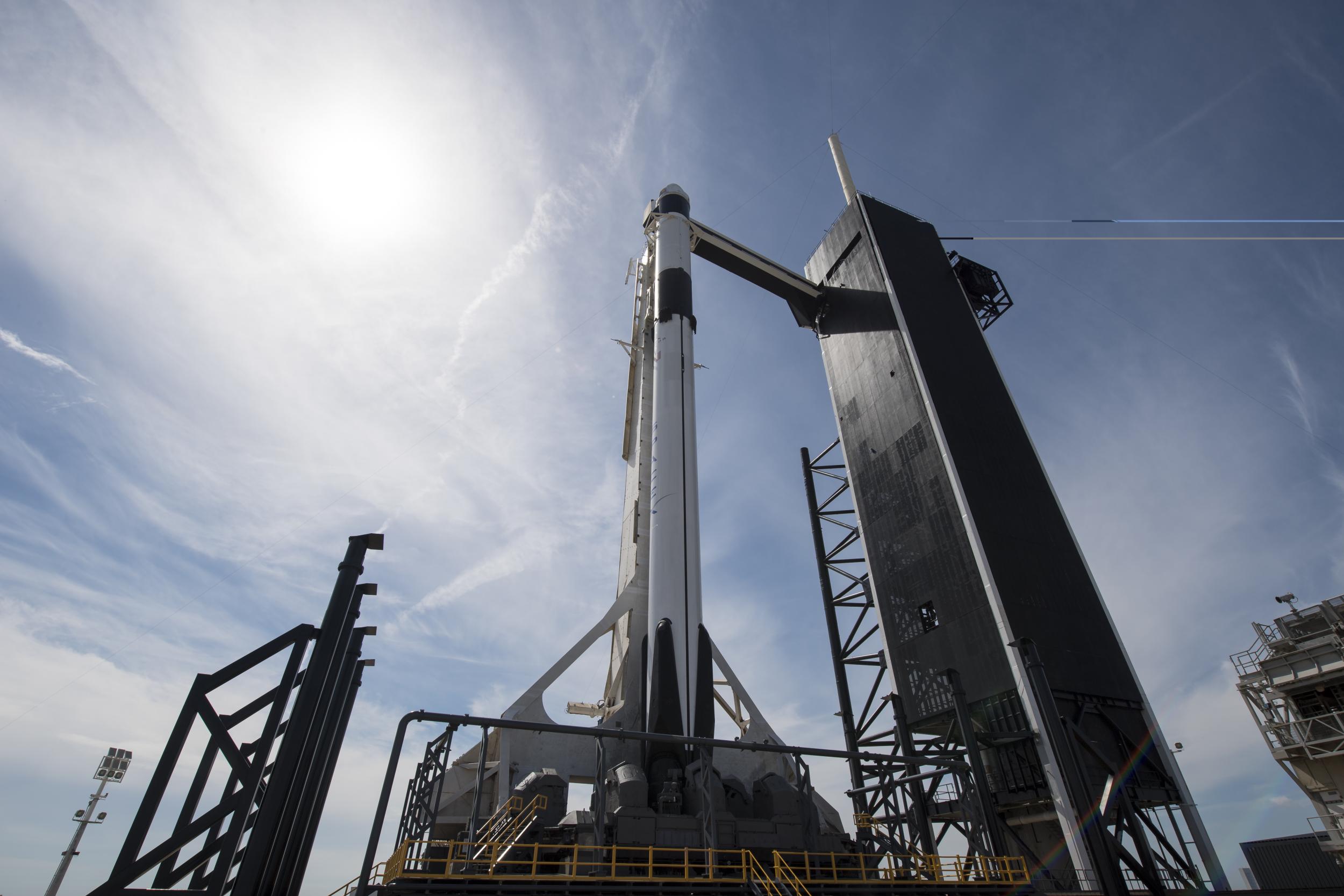 SpaceX Falcon 9 rocket with the company’s Crew Dragon spacecraft onboard is seen on the launch pad at Launch Complex 39A as preparations continue