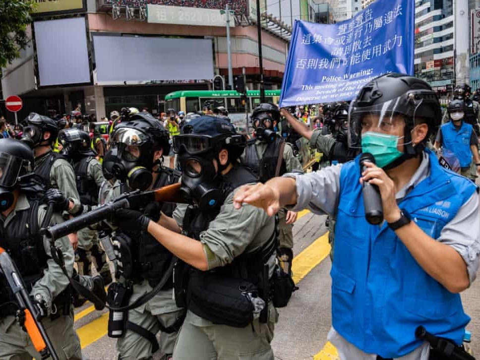 Riot police during a protest against a planned national security law in the Causeway Bay district of Hong Kong