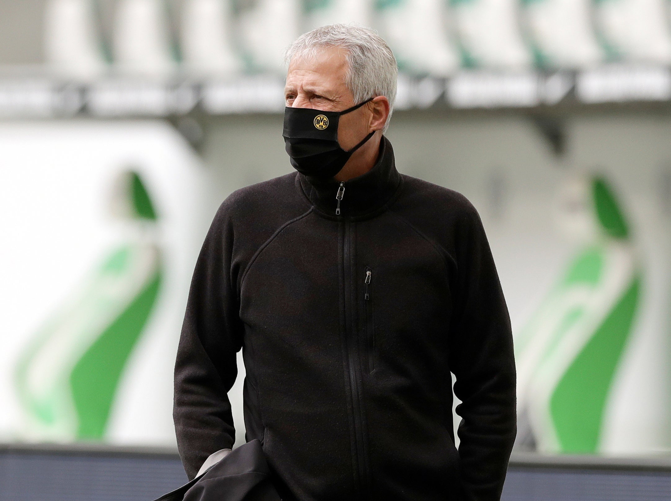 Borussia Dortmund coach Lucien Favre sports a face mask in Germany