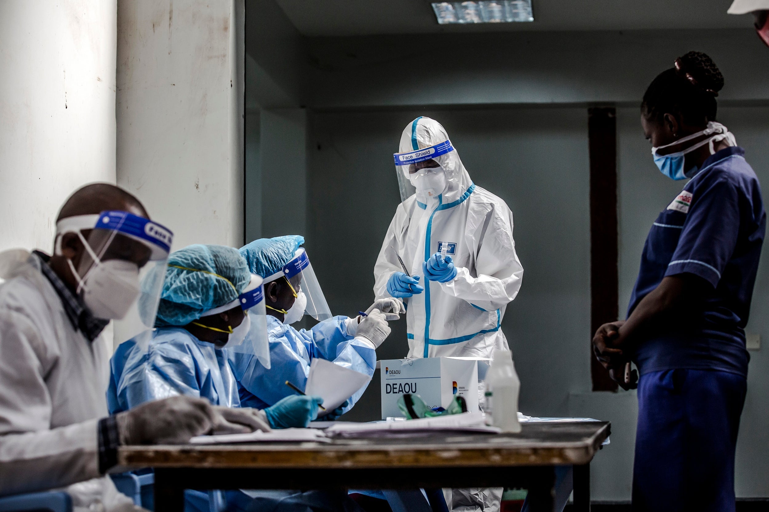 Healthcare workers prepare tests (The Washington Post)
