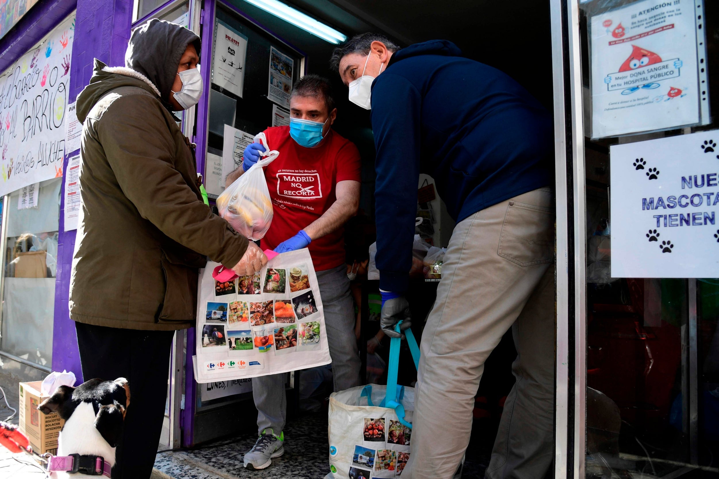 Free rations are handed out at a food bank in Madrid (AFP/Getty)