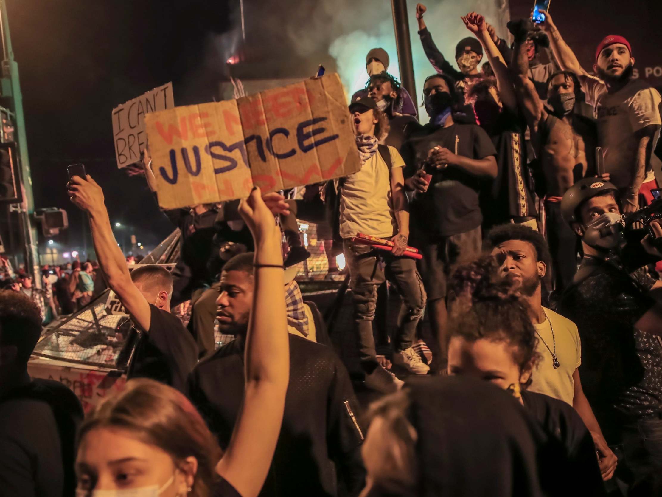 Protesters gather outside Minneapolis Police Department