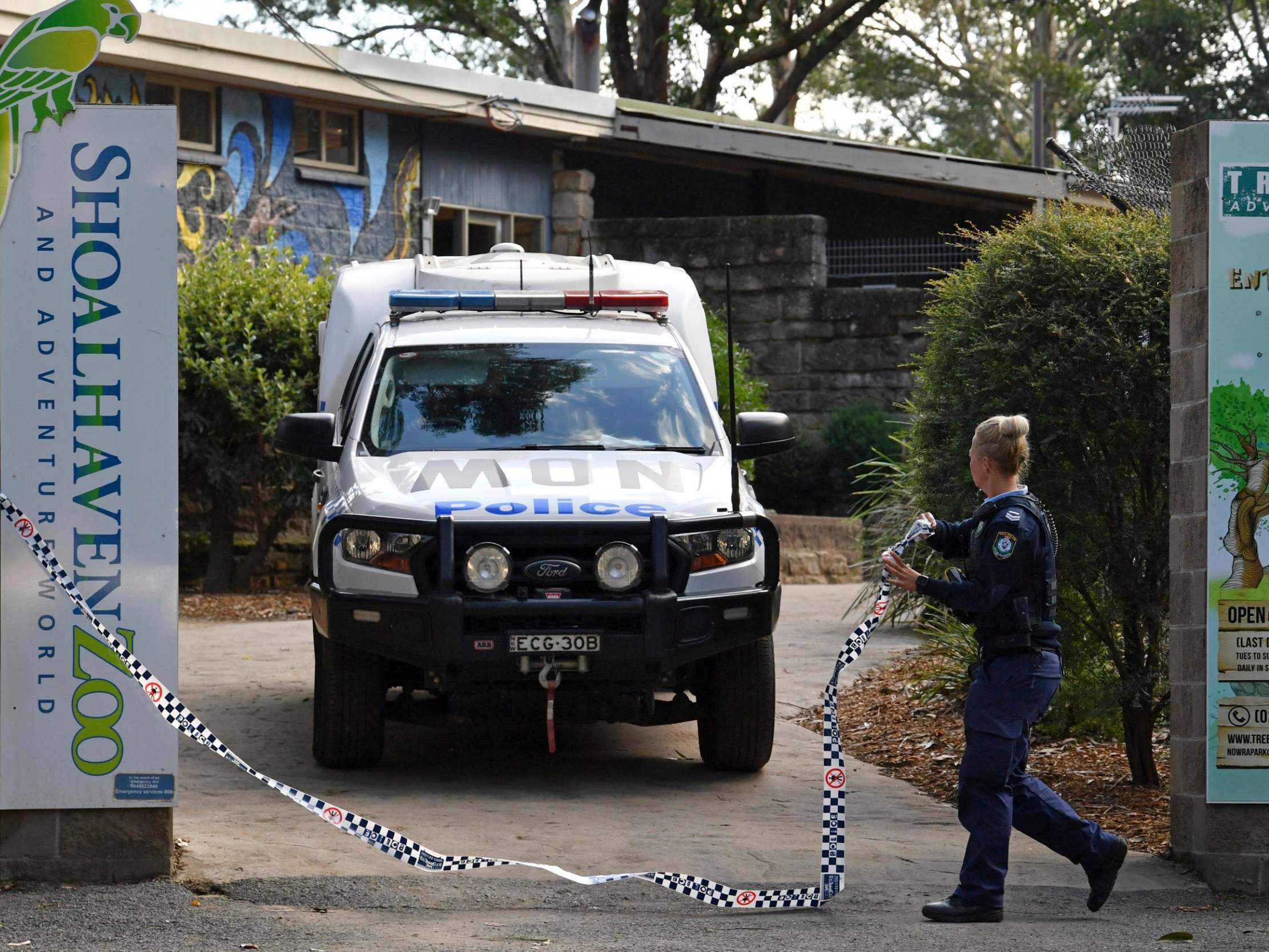 Police work at the Shoalhaven Zoo in Nowra, Australia, Friday, May, 29, 2020, where an animal keeper has been critically injured