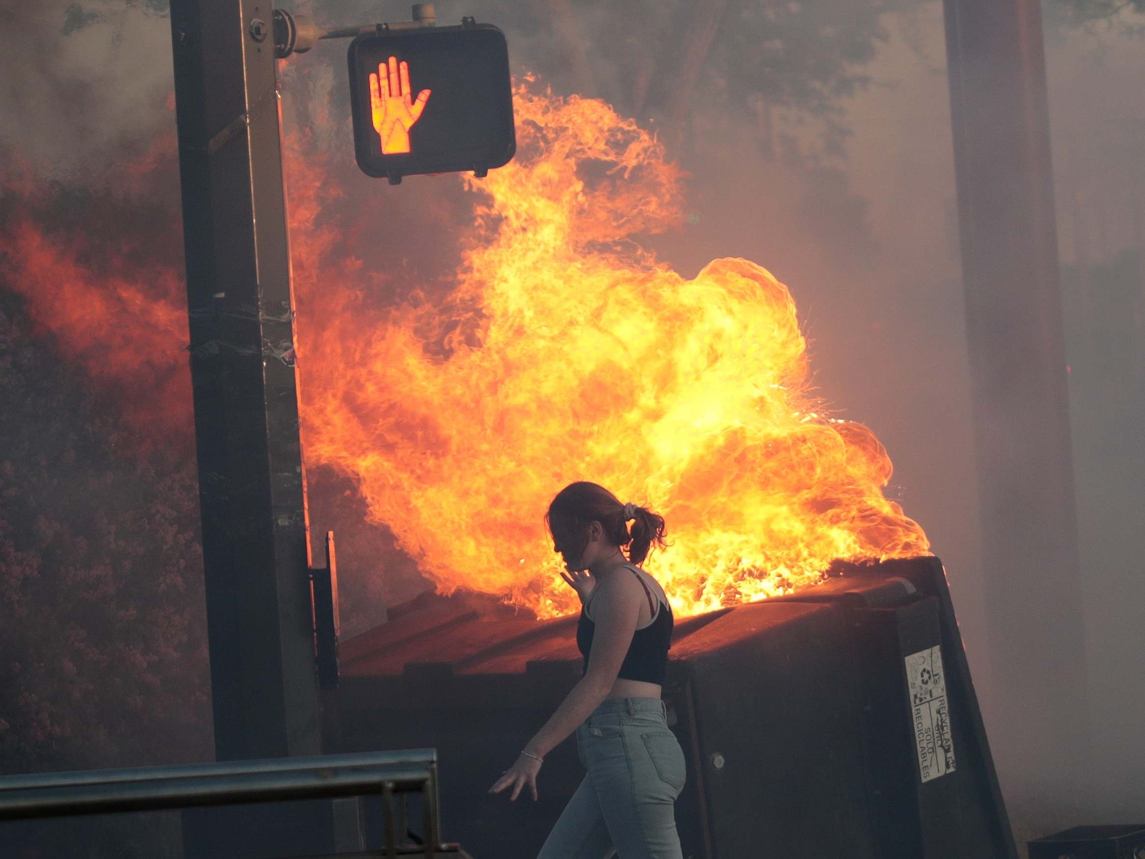 Protesters set fire to bins in St. Paul