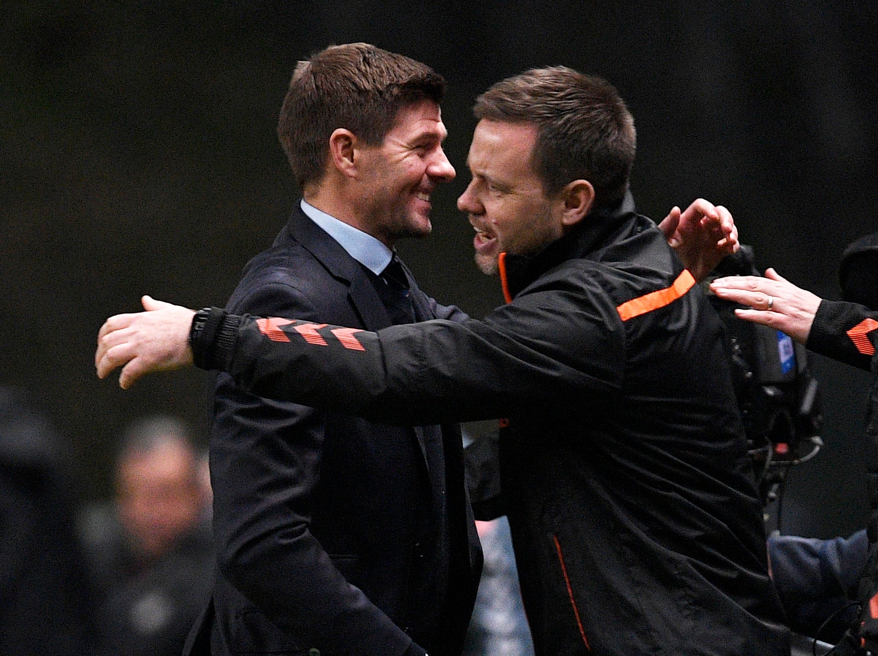 Gerrard and Beale celebrate after victory over Braga in February 2020