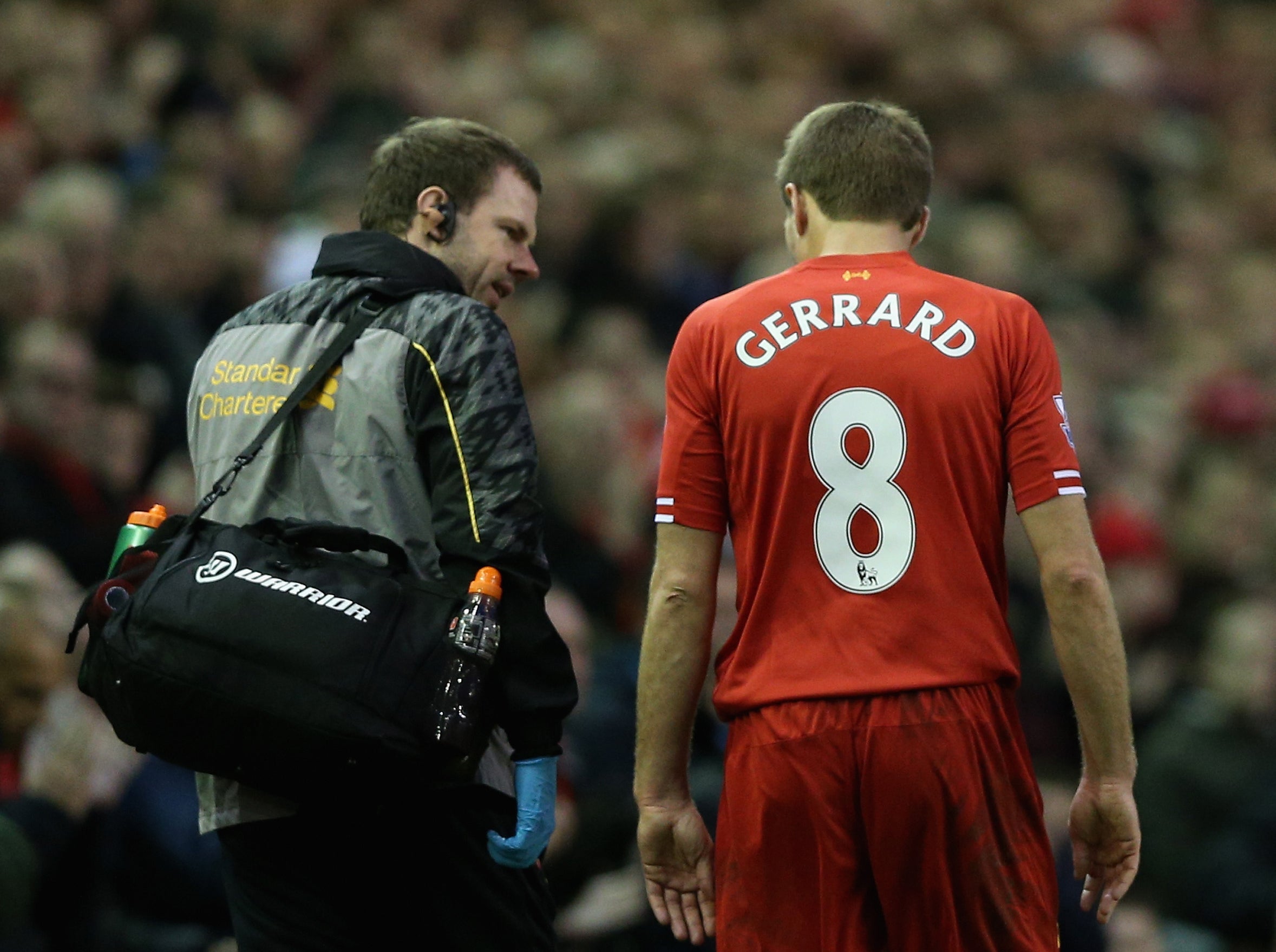 Morgan talking to Gerrard after an injury in December 2013