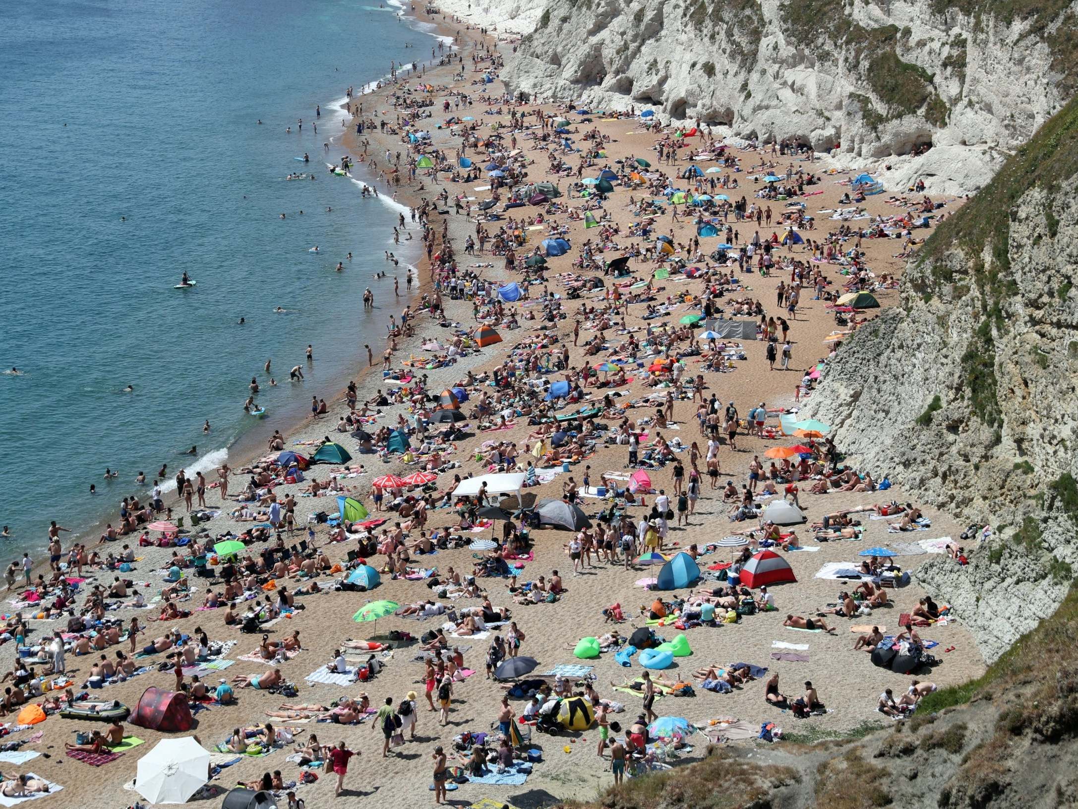 The beach at Durdle Door was crowded on Saturday (PA Wire)