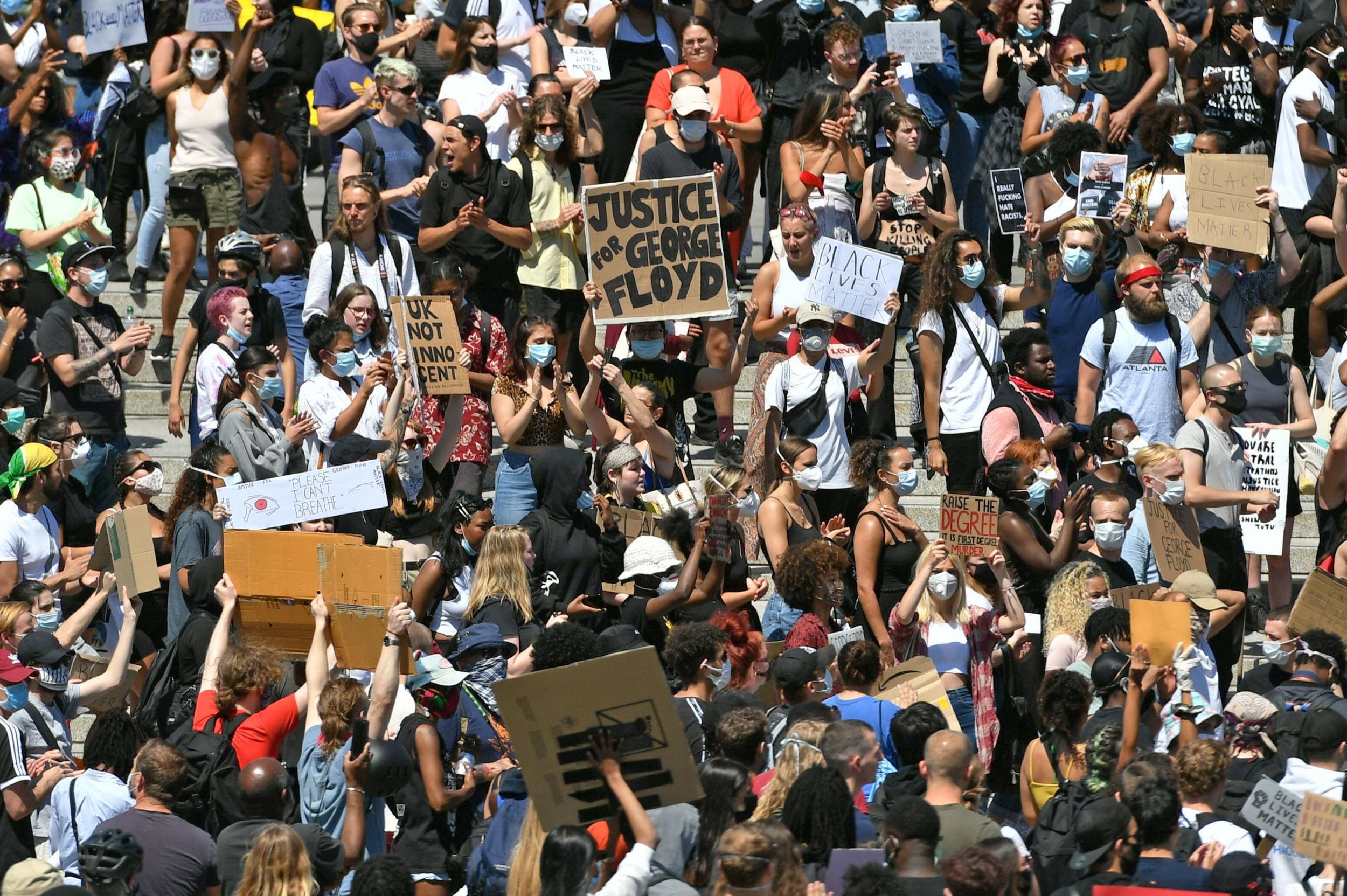 Some in the London crowd wore masks