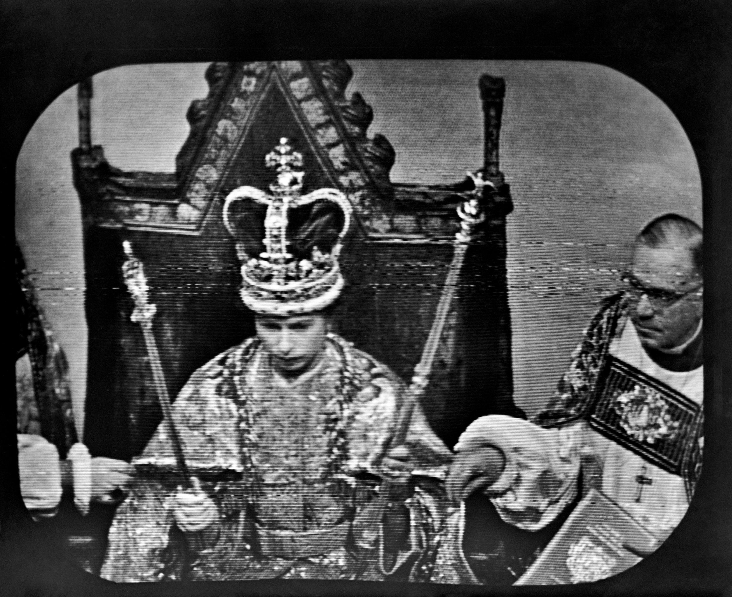 Queen Elizabeth II wears St Edward's Crown at the Coronation ceremony at Westminster Abbey. This was the view as seen by television viewers immediately after the Archbishop of Canterbury, Dr Geoffrey Fisher, placed the Crown upon the Queen's head