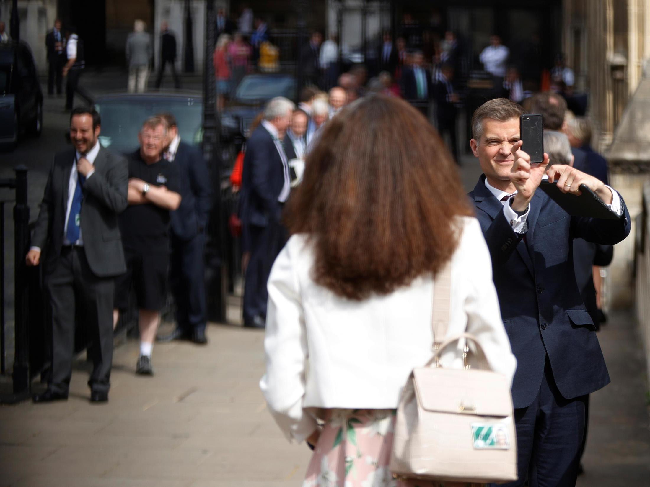 MPs queuing up to vote outside parliament