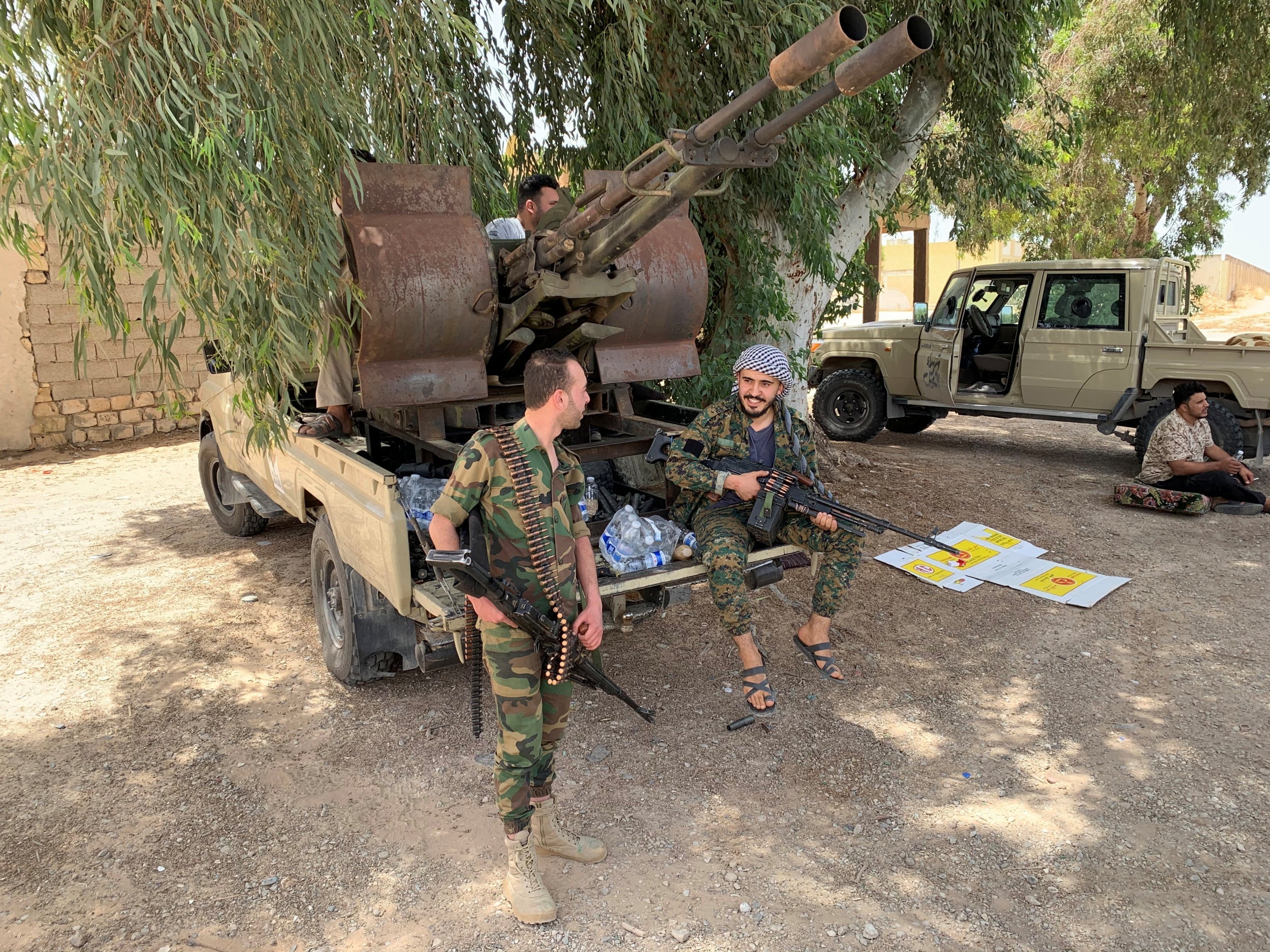 Fighters loyal to the GNA in Tripoli on Thursday (Reuters)