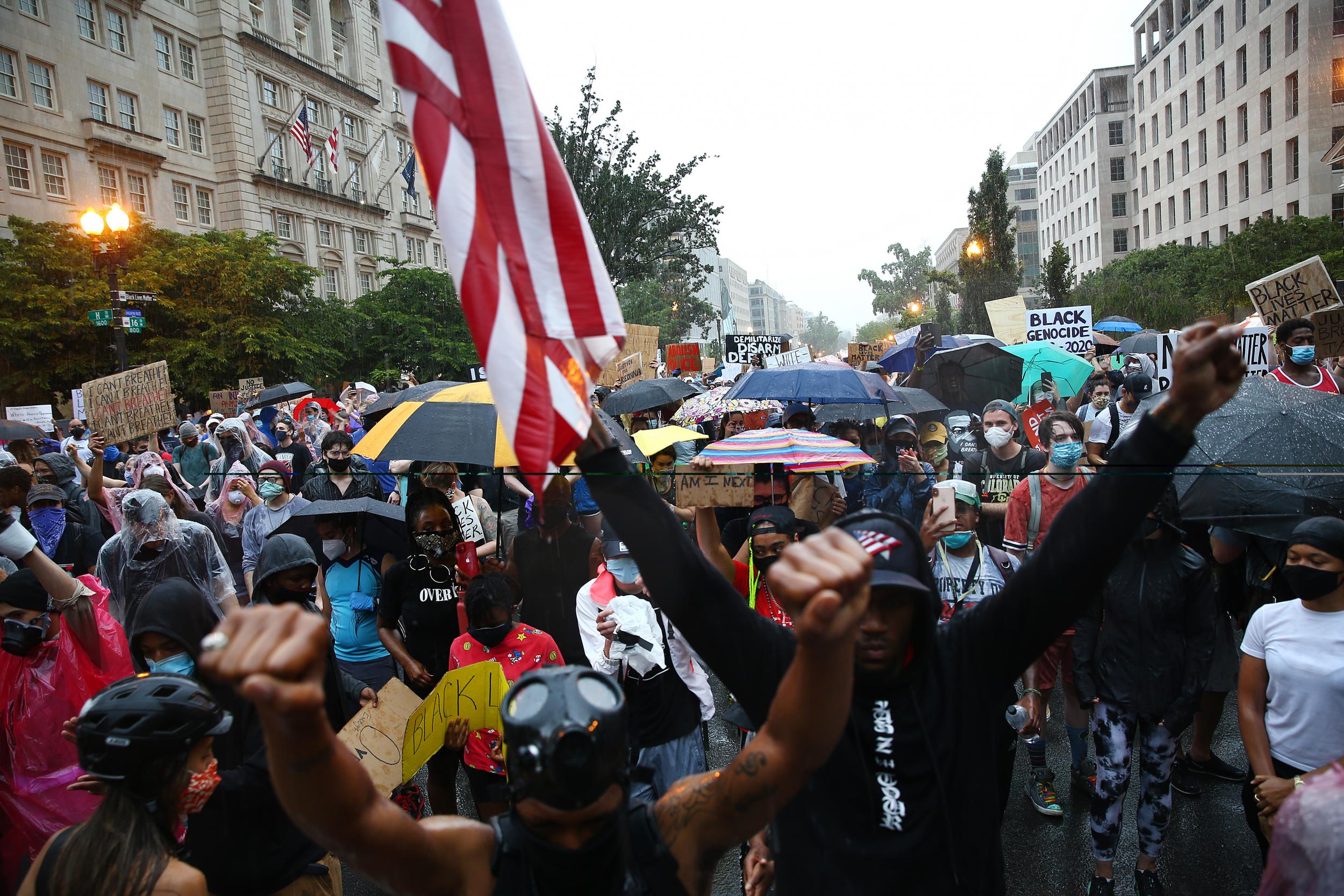 Demonstrators gather on 16th street near Lafayette Park during a peaceful protest against police brutality and the death of George Floyd