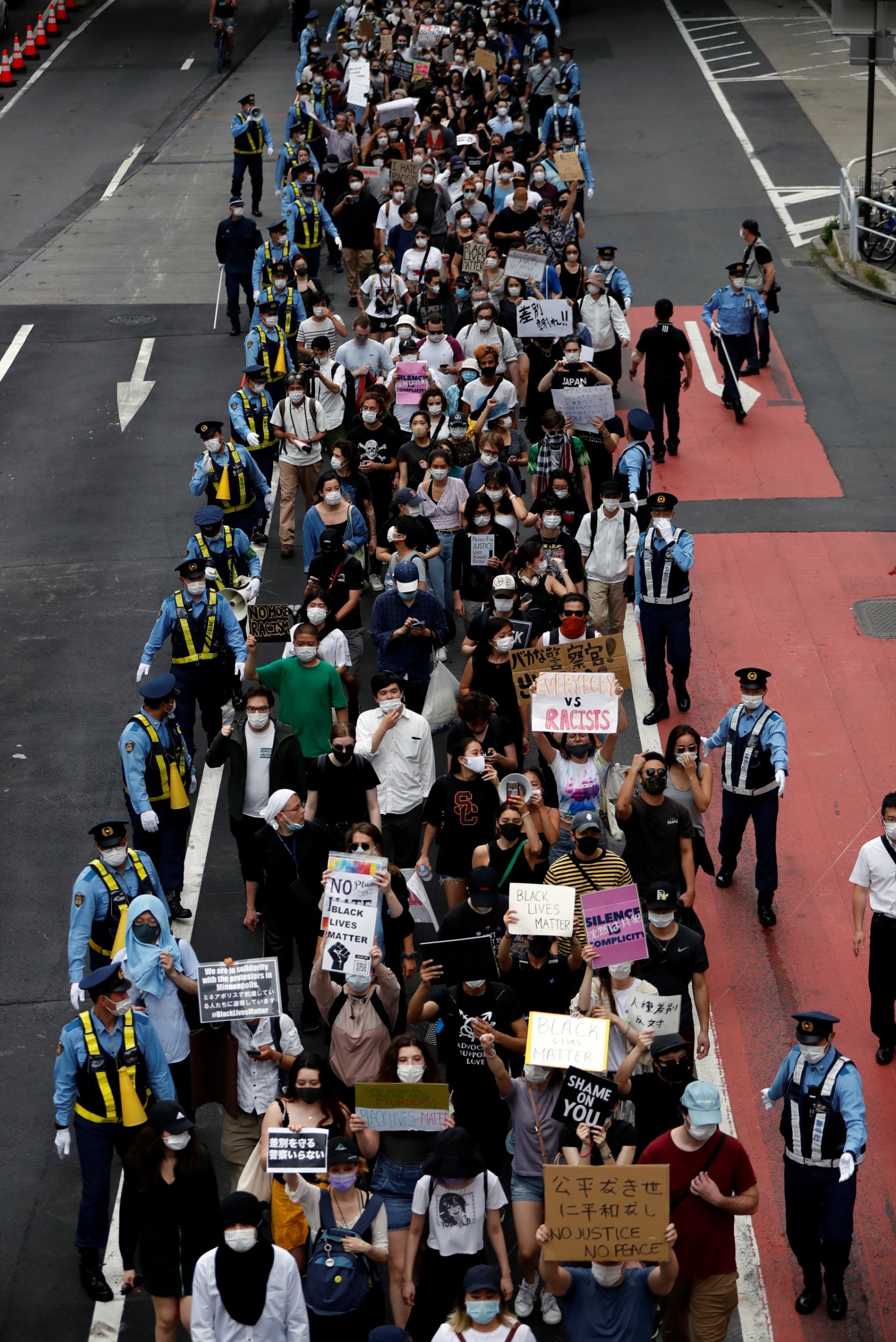 People in Tokyo protest the alleged police abuse of a Turkish man, following the death of George Floyd