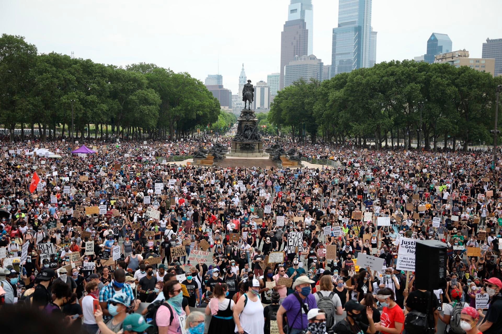 Protesters gather along the steps of the Philadelphia Art Museum and Eakins Oval during a protest