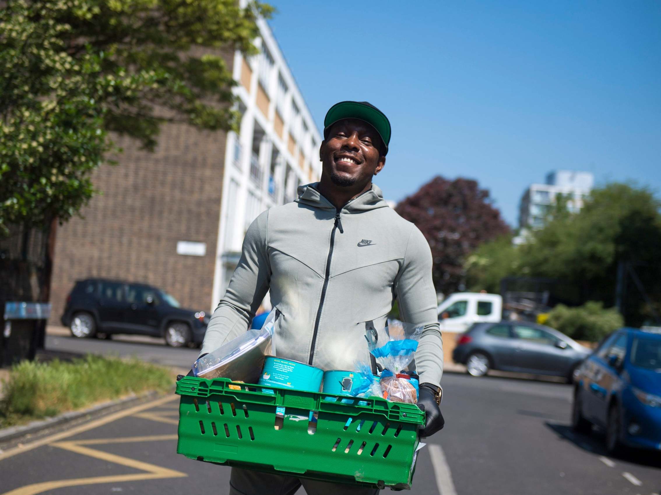 Dizzy Rascal helping out at the Bygrove Primary School’s food bank in east London
