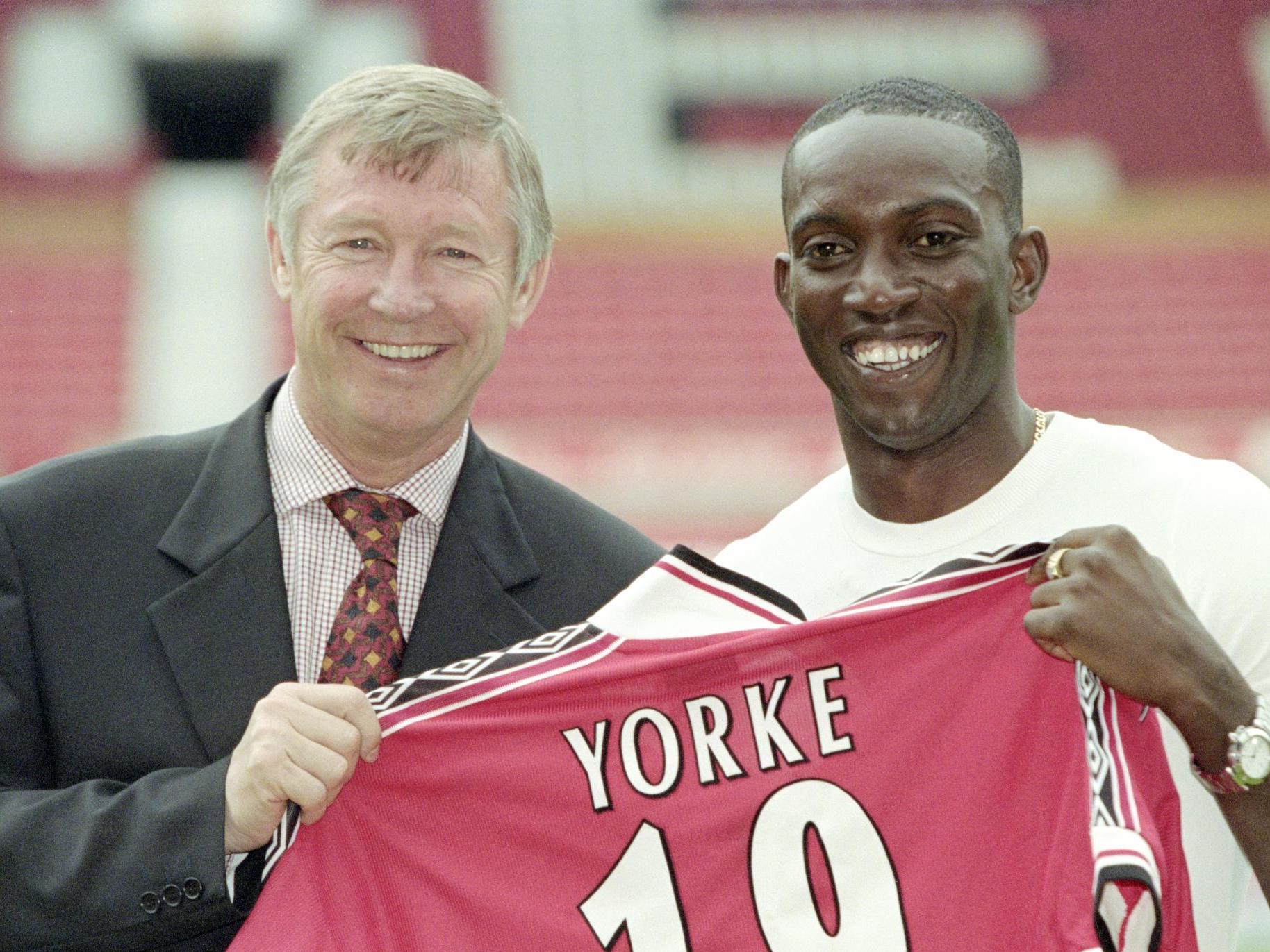 Dwight Yorke and former manager Sir Alex Ferguson at Old Trafford