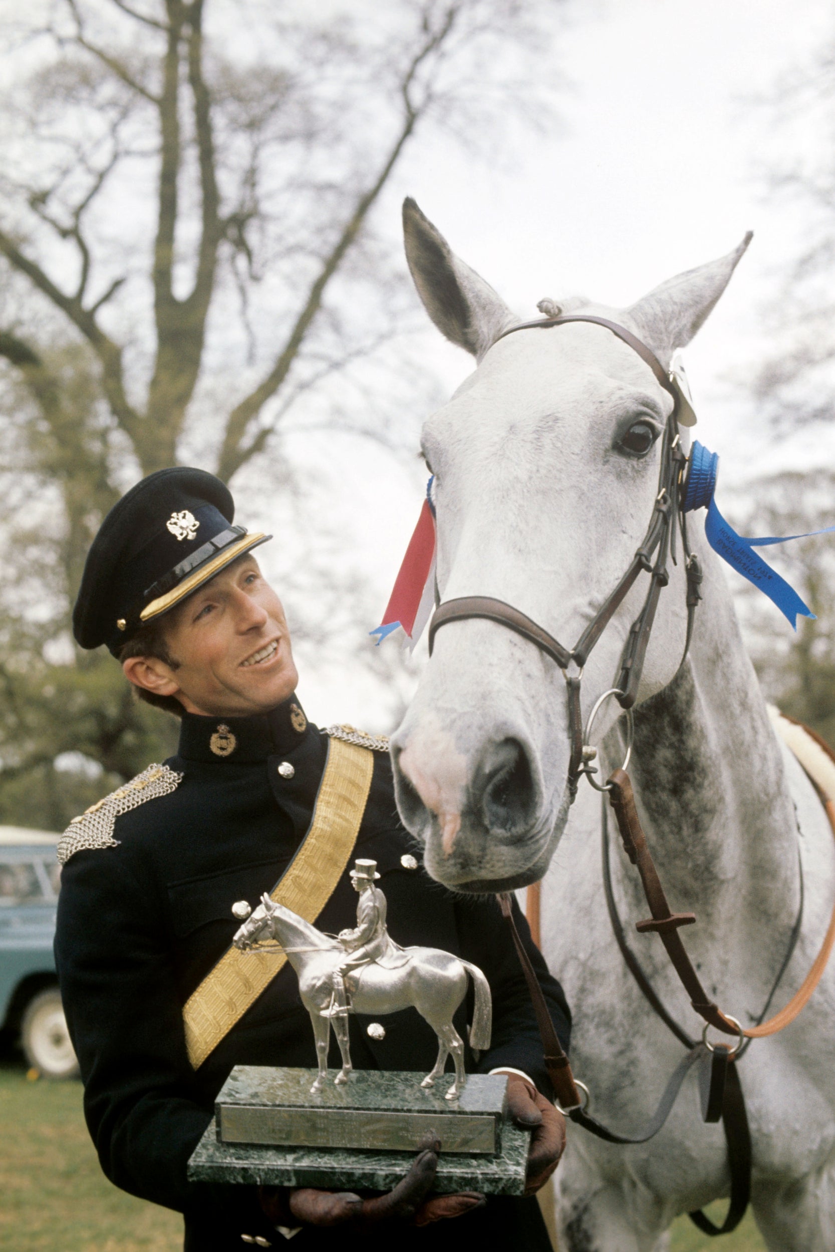 Captain Mark Phillips with the Queen’s horse Columbus and the Whitbread Trophy after his third victory in the Badminton Horse Trials, 27 April 1974