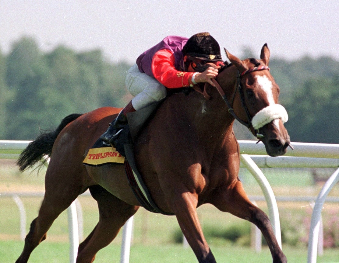 Phantom Gold, ridden by Frankie Dettori, winning The Triple Print Geoffrey Freer Stakes at Newbury, 17 August 1996