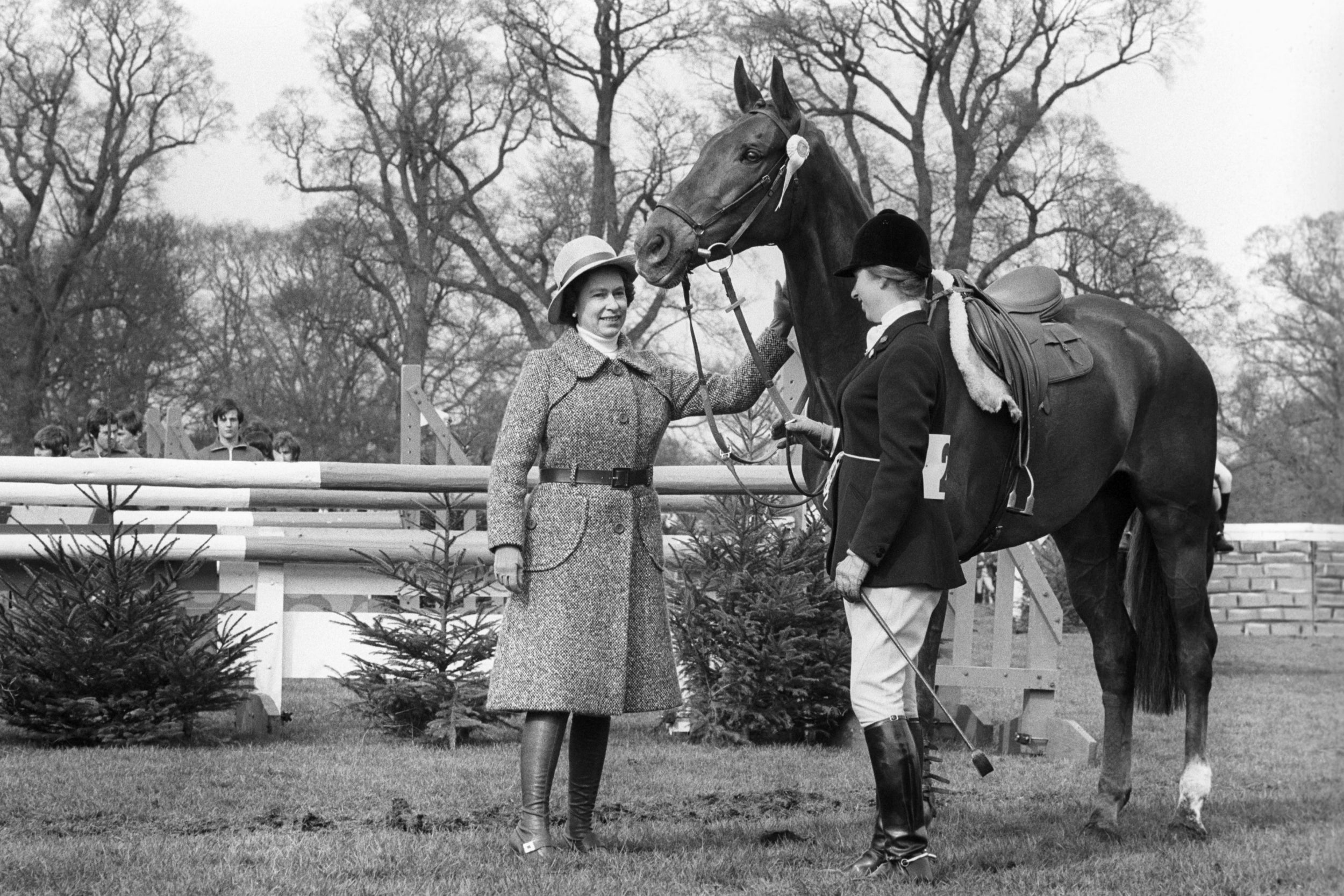 A ‘well done’ pat for Doublet as the Queen congratulates Princess Anne and her mount after they had taken fifth place in the Badminton Horse Trials, 25 April 1971