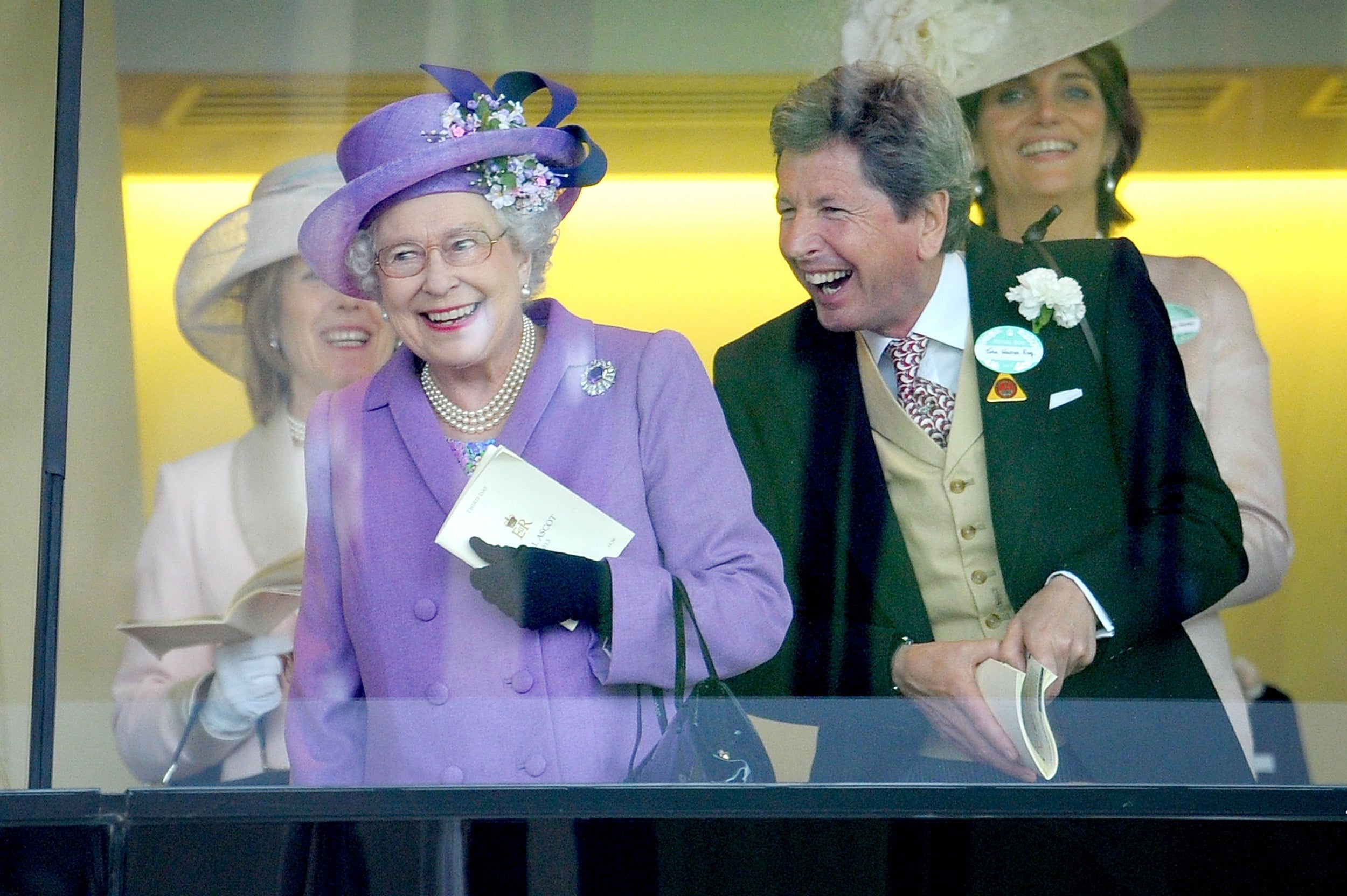 Queen Elizabeth II with her racing manager John Warren after her horse, Estimate, won the Gold Cup on day three of the Royal Ascot meeting at Ascot Racecourse, Berkshire, 20 June 2013