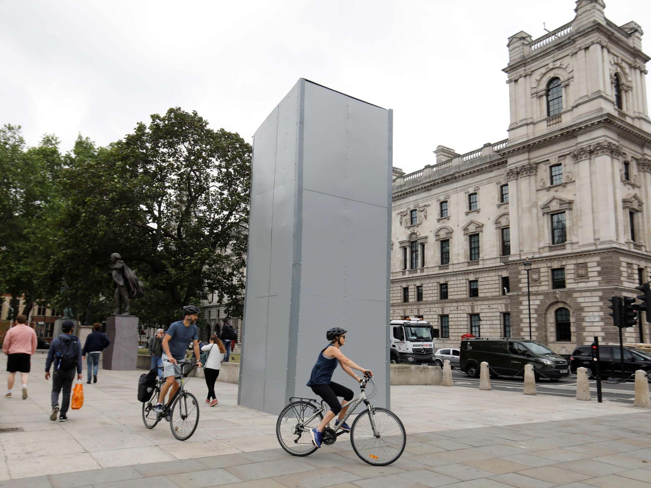 A statue of Winston Churchill is boarded up on Parliament Square in central London on 12 June 2020 (AFP/Getty)