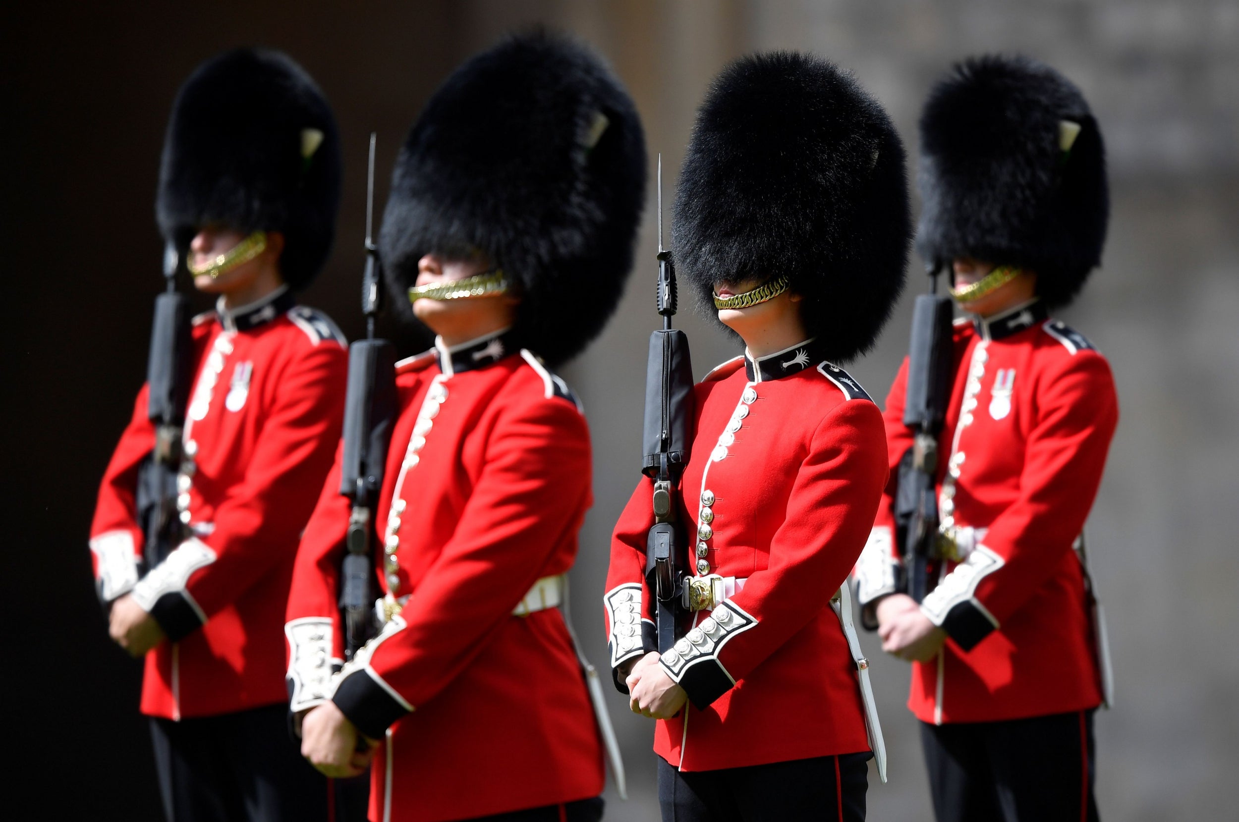 Members of the Welsh Guards perform during a ceremony to mark Britain’s Queen Elizabeth II official birthday, at Windsor Castle in Windsor, southeast England on June 13, 2020