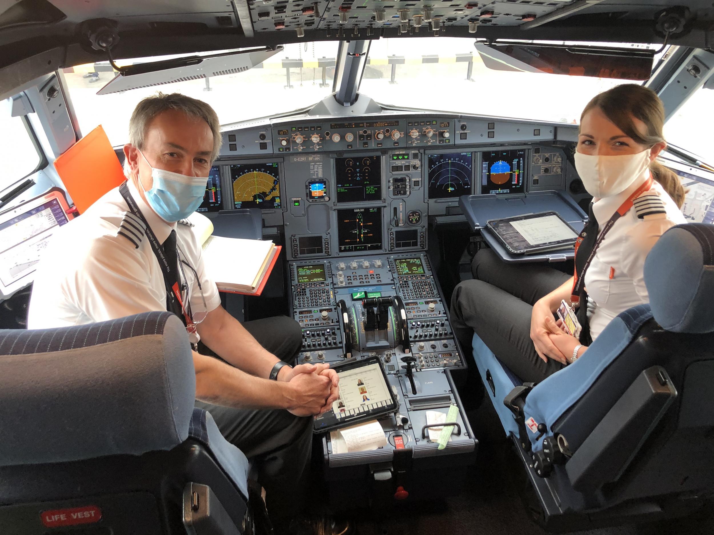 Front seats: Captain David Morgan and Captain Kate McWilliams at the controls of easyJet flight 883