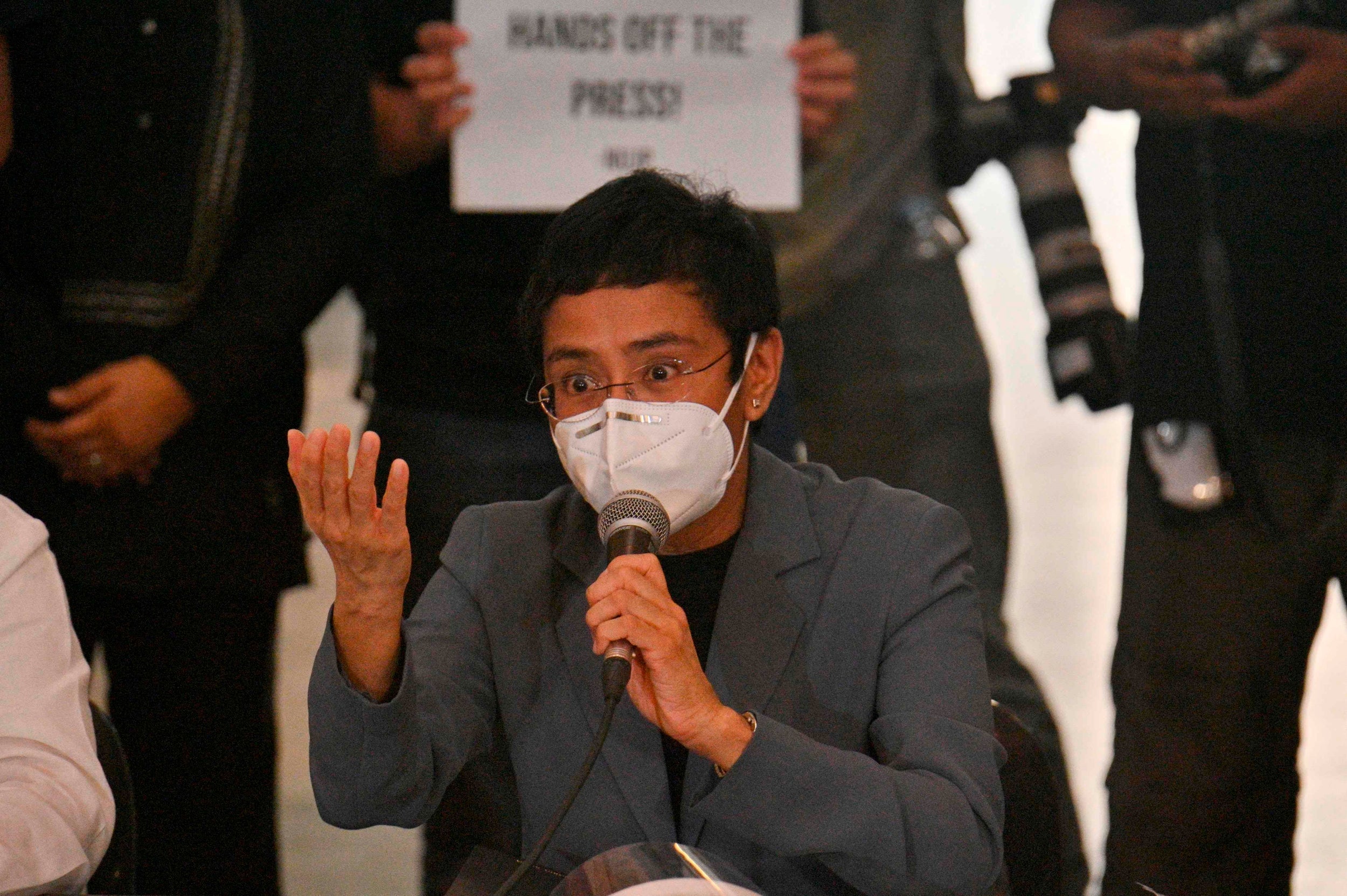 Philippine journalist Maria Ressa speaks during a news conference after receiving the court's verdict in Manila on Monday