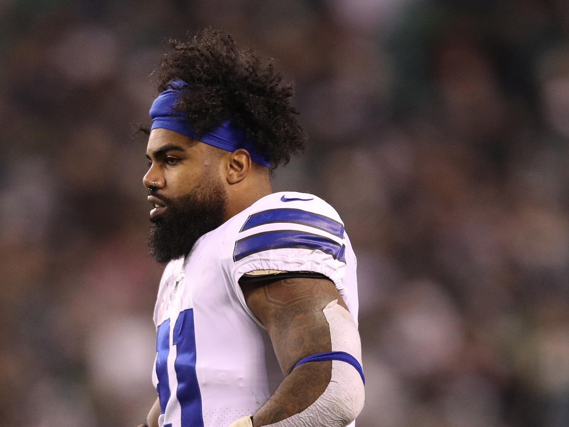 Ezekiel Elliott #21 of the Dallas Cowboys looks on against the Philadelphia Eagles at Lincoln Financial Field in December 2019