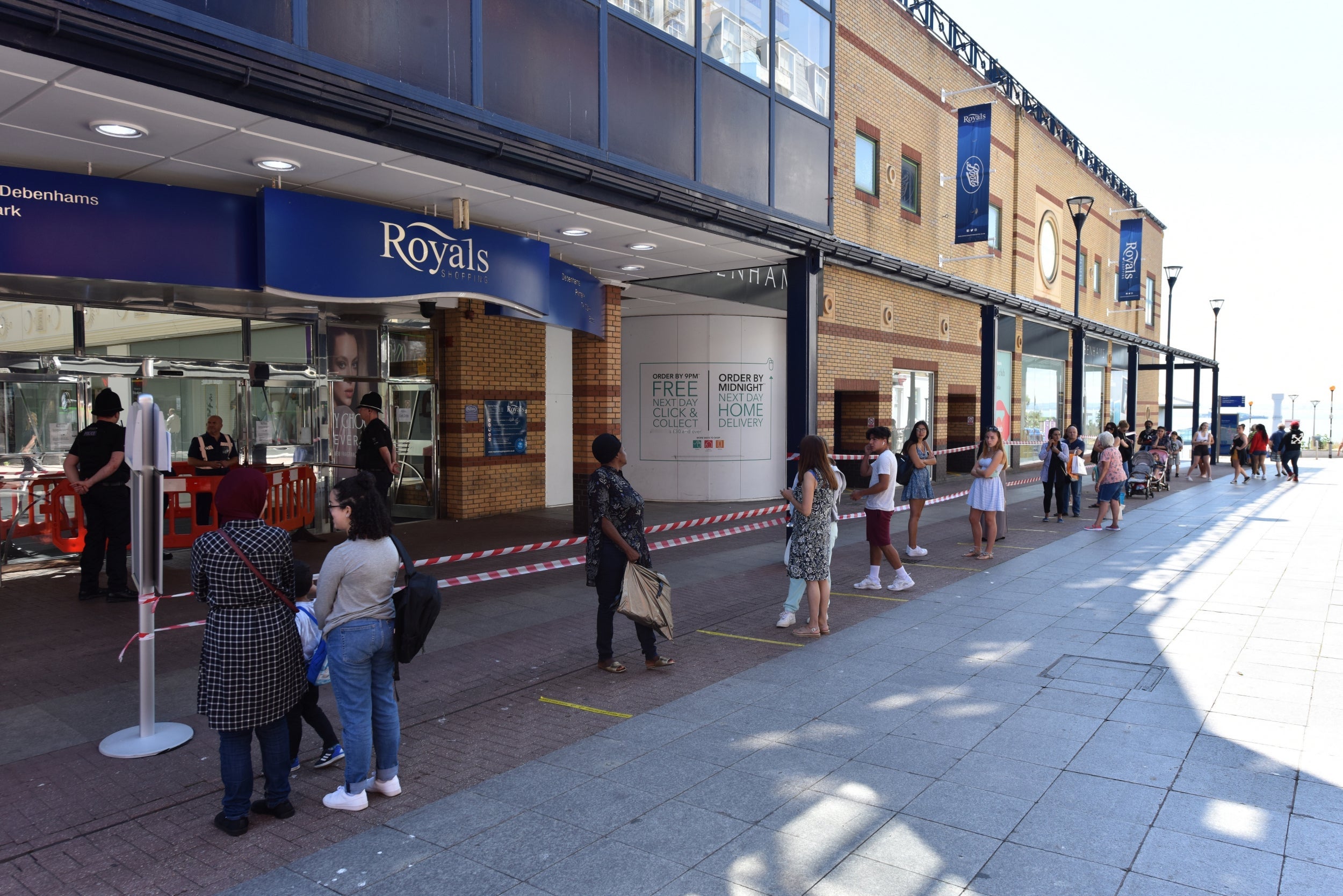 People queue for Primark and T K Maxx at the Royals Shopping centre on Monday in Southend-on-Sea