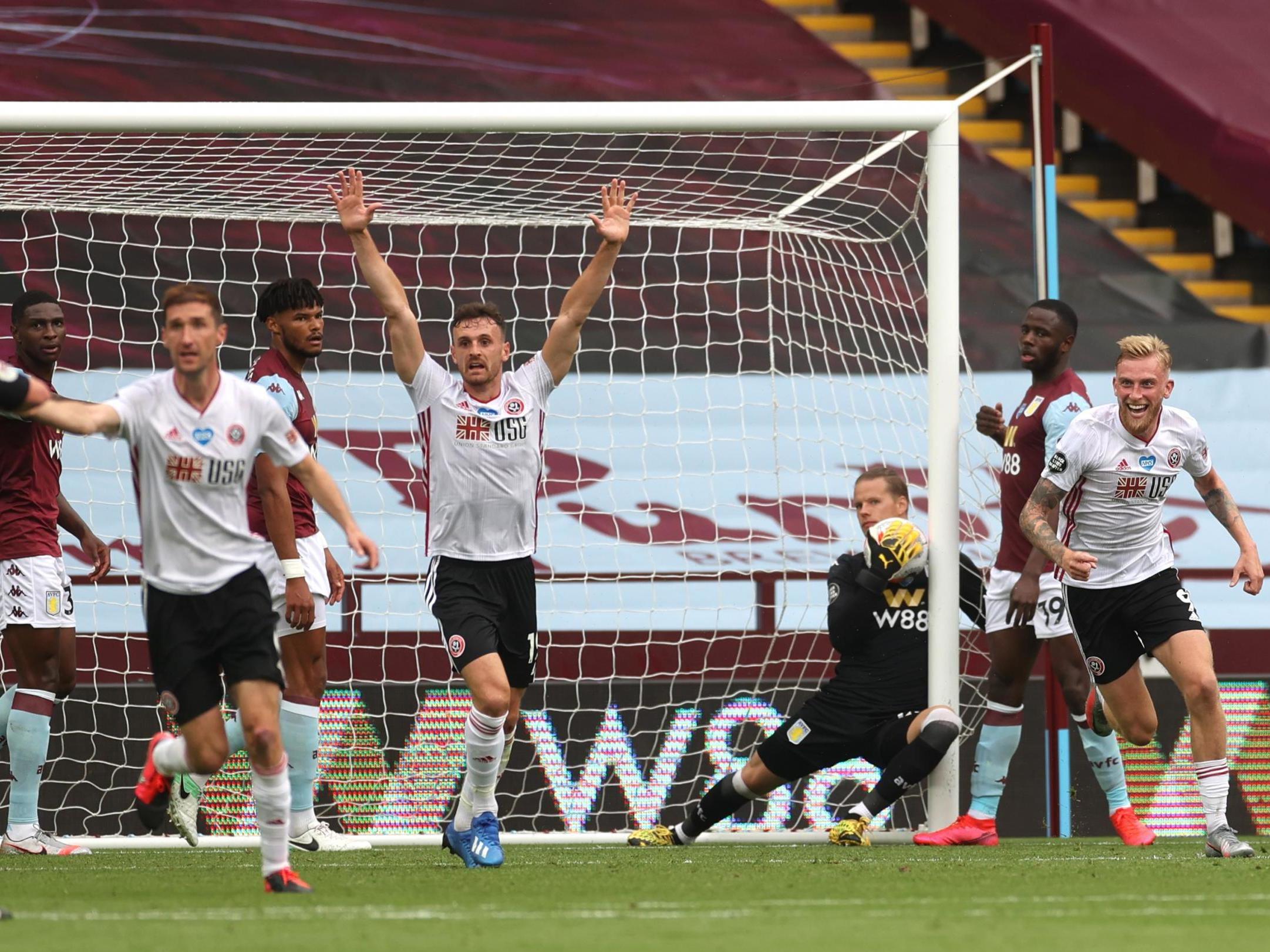 Sheffield United appeal for a goal after Orjan Nyland appears to carry the ball past the line (Getty)