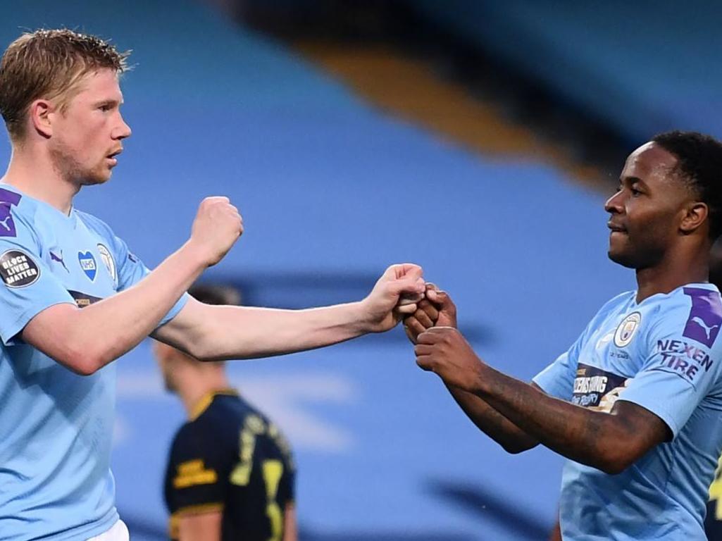 City celebrate after De Bruyne scores from the spot