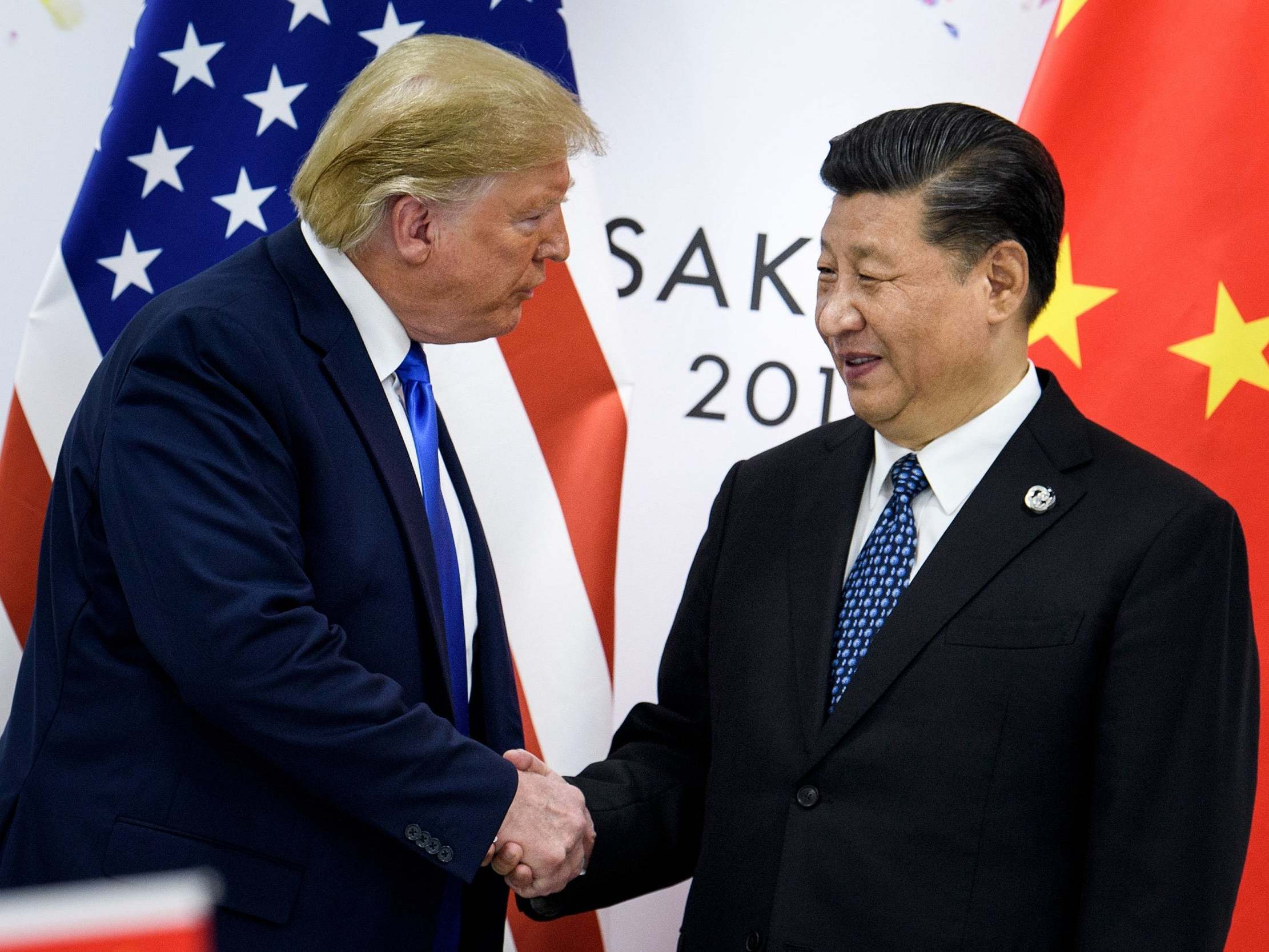 Donald Trump, left, and Xi Jinping have had a topsy-turvy relationship