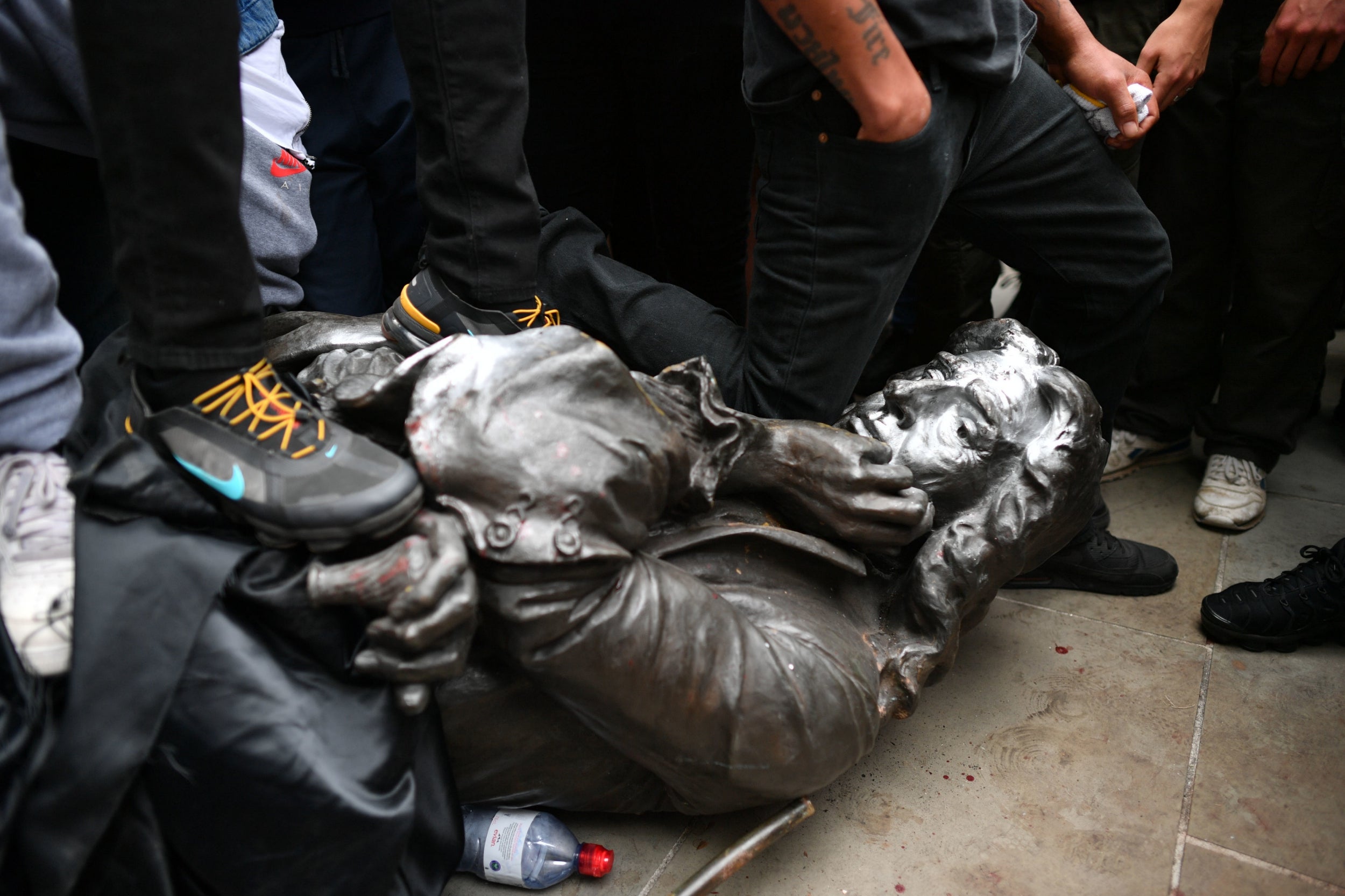 The statue of Edward Colston is pulled to the ground by protesters during a Black Lives Matter protest rally in Bristol