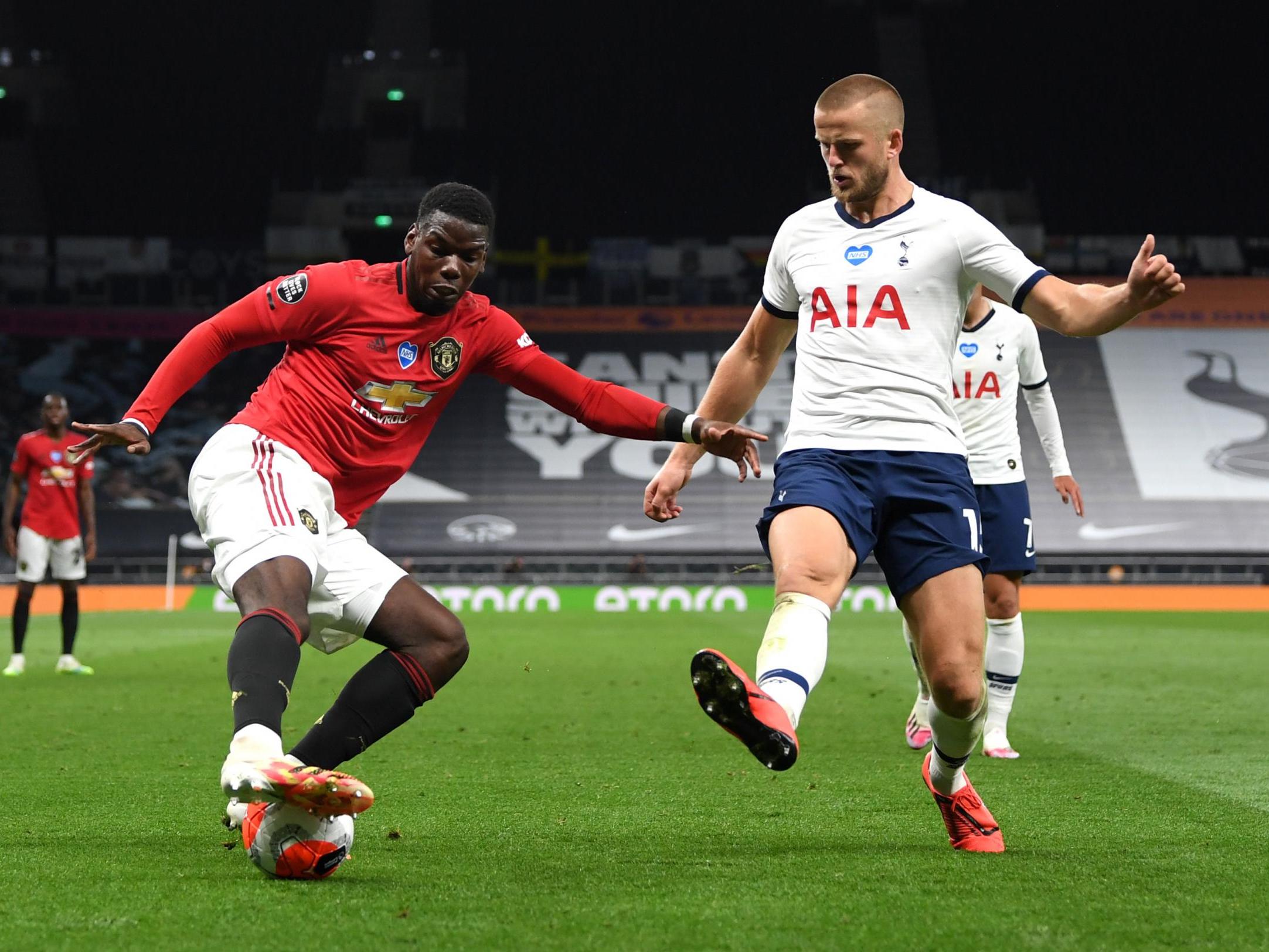 Pogba, moments before drawing a foul from Eric Dier, right