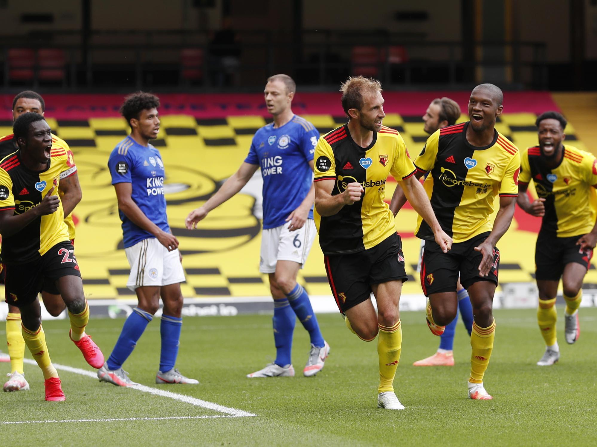 Craig Dawson celebrates his stoppage-time overhead kick