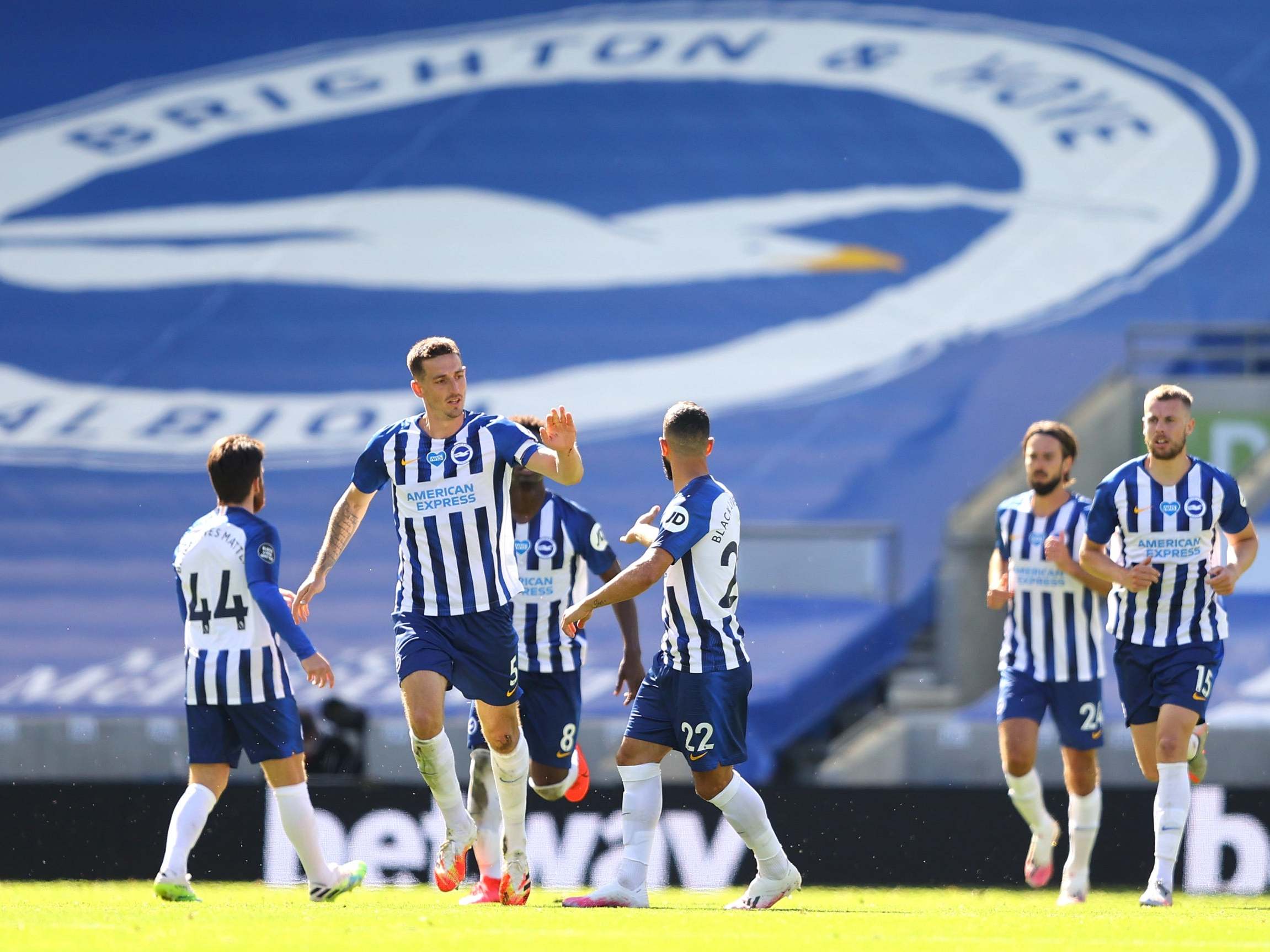 Lewis Dunk celebrates after scoring Brighton’s equaliser