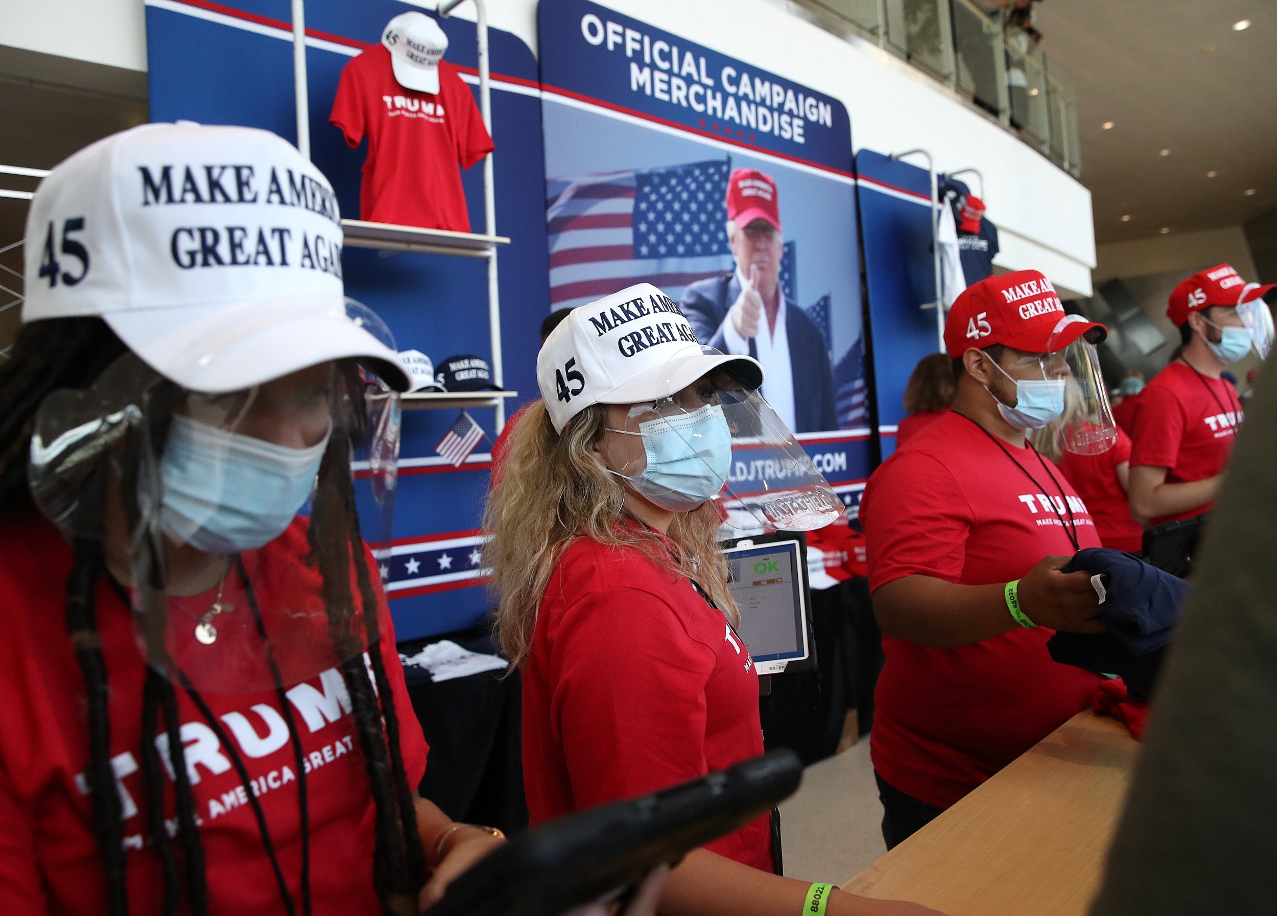 Merchandise vendors wearing masks at the BOK Centre in Tulsa, Oklahoma